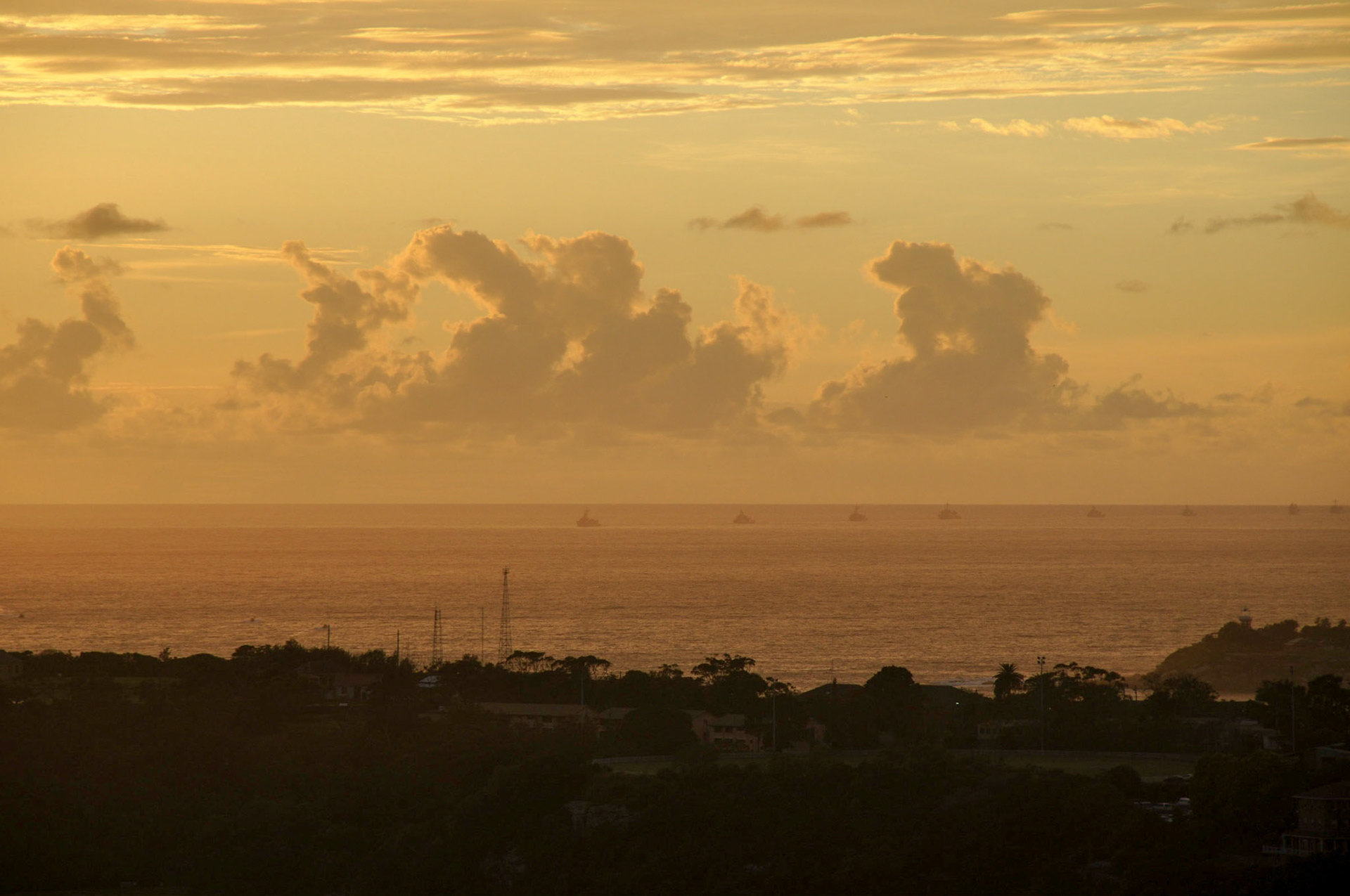 Line of Navy boats heading to the harbour