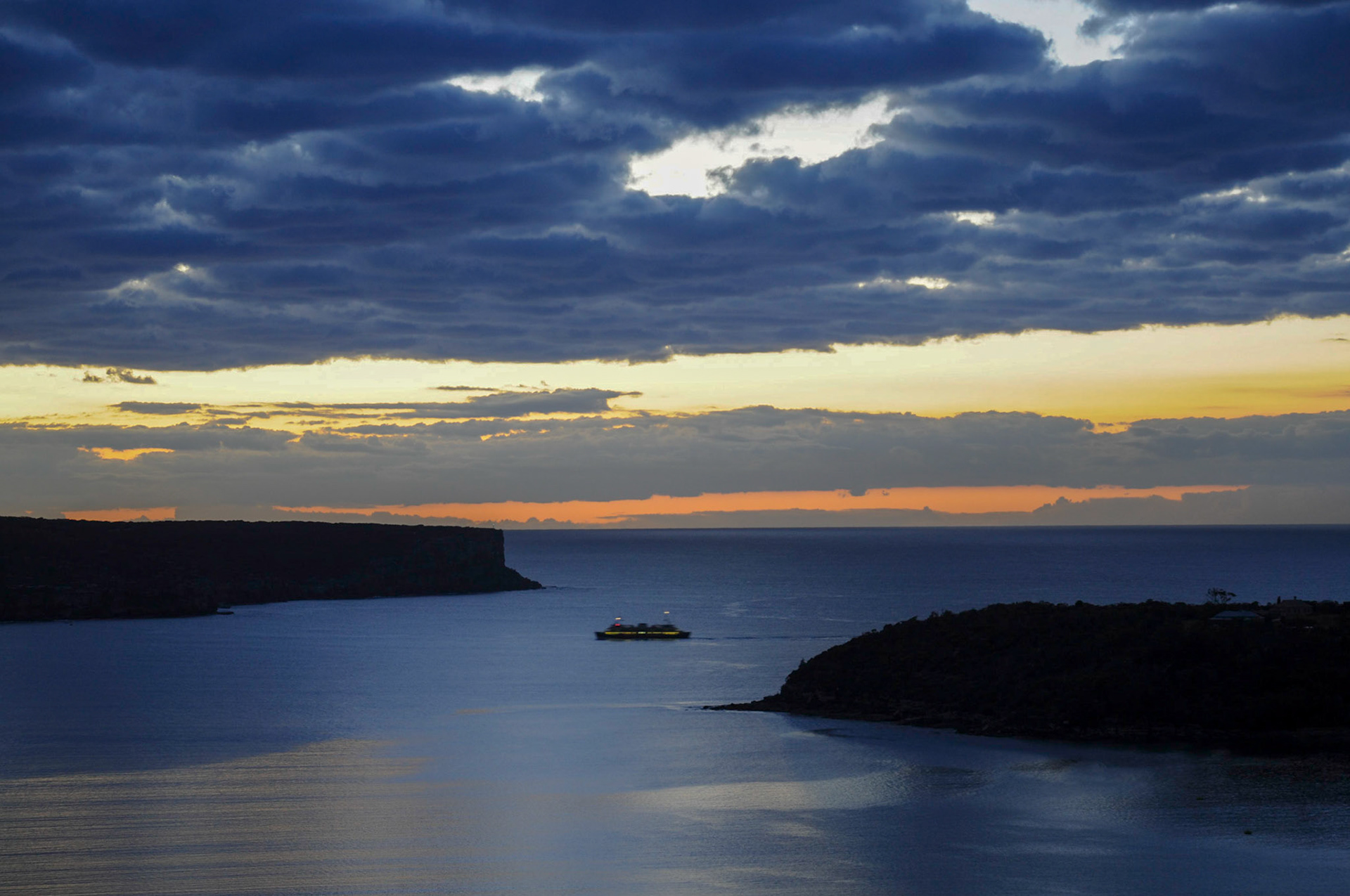 Early morning Manly ferry passing North Head.