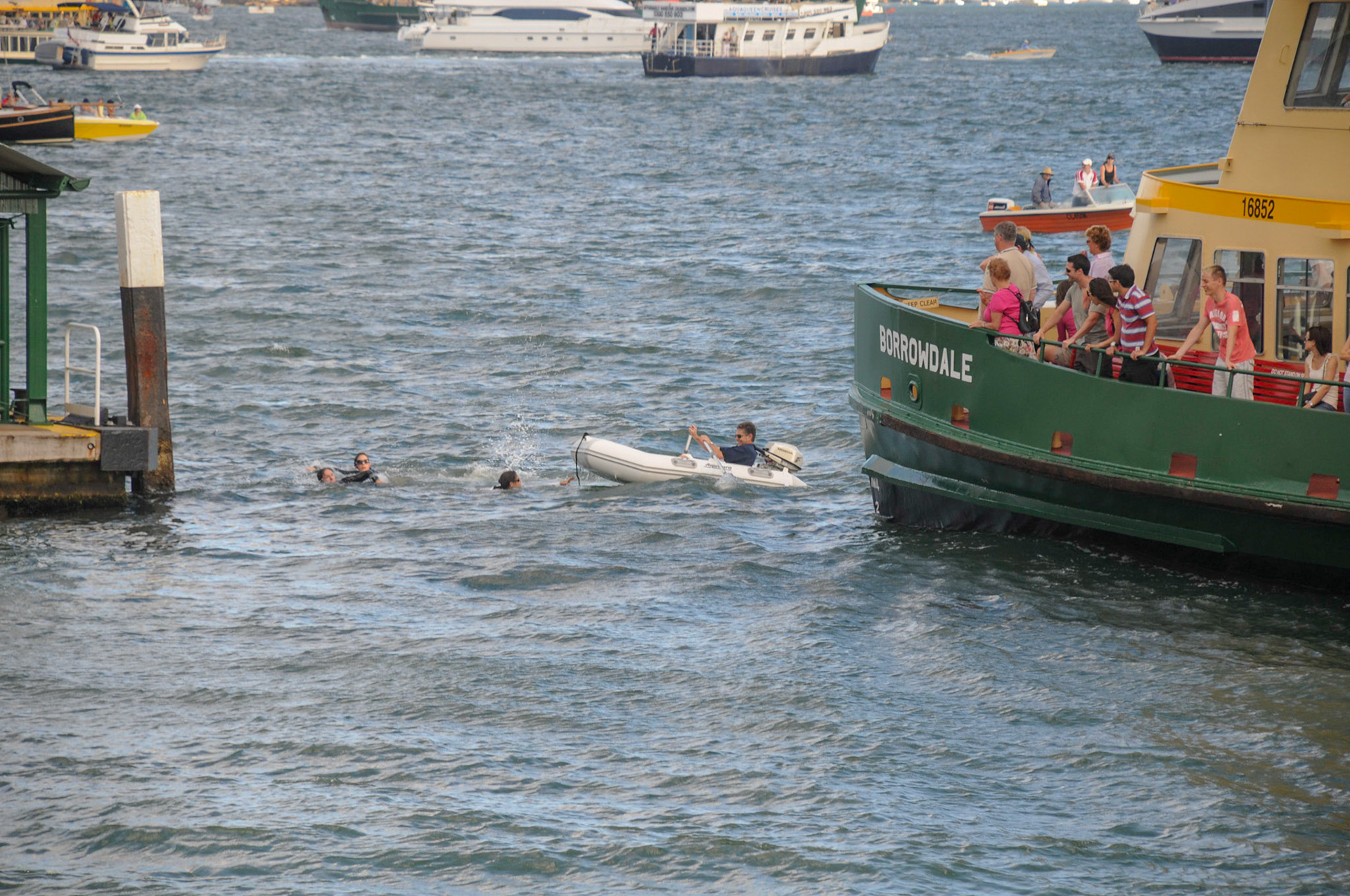Spectator boat gets too close to a ferry