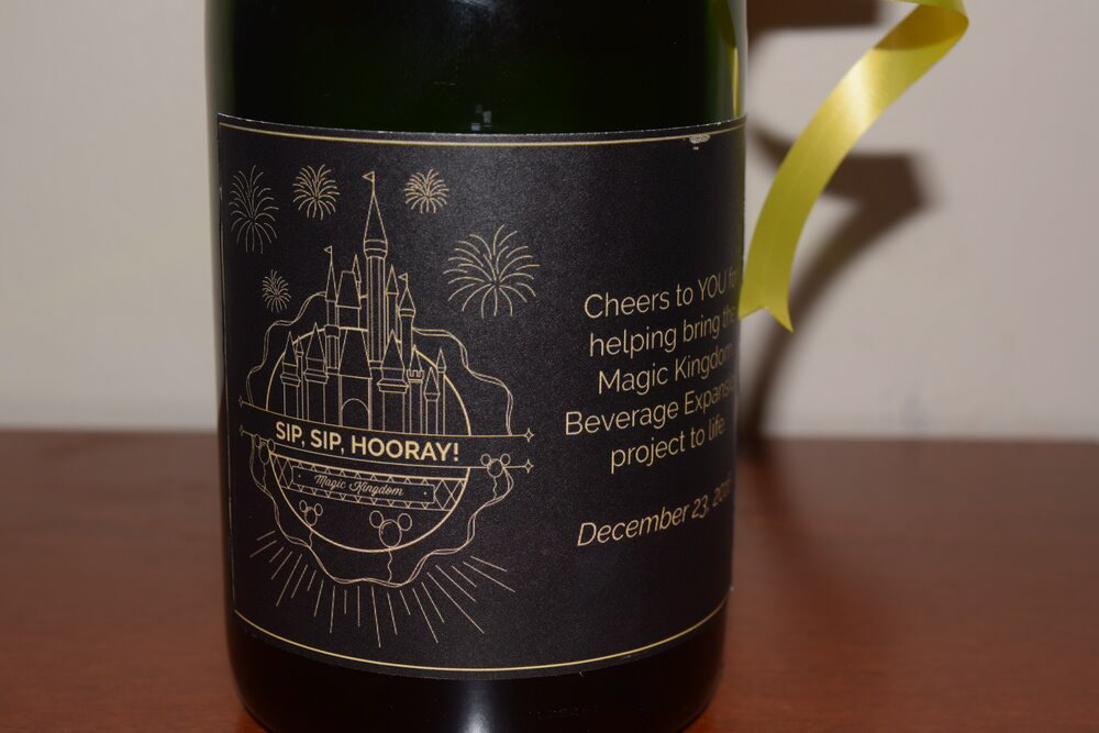 Artwork was leveraged to create champagne labels given to park executives.