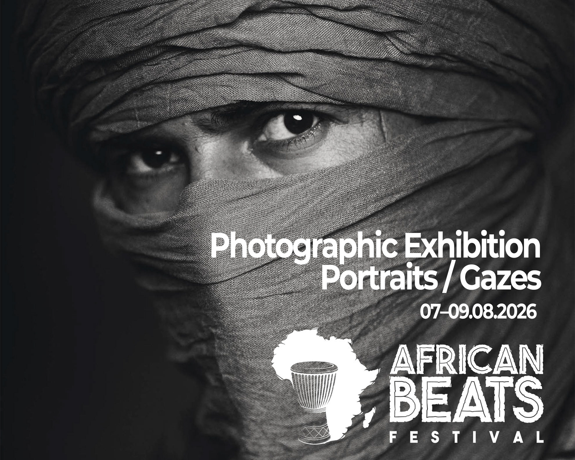 Black and white portrait of Kader Tarhanine in a Tuareg veil for the Photography Exhibition Portraits / Gazes by Piotr Skubisz at African Beats Festival 2026