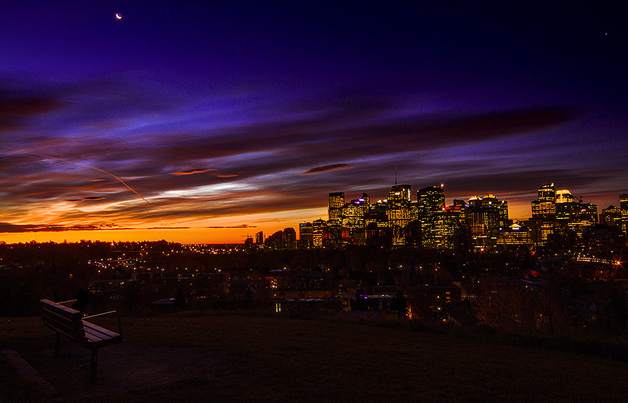 Calgary skyline moon bench night time
