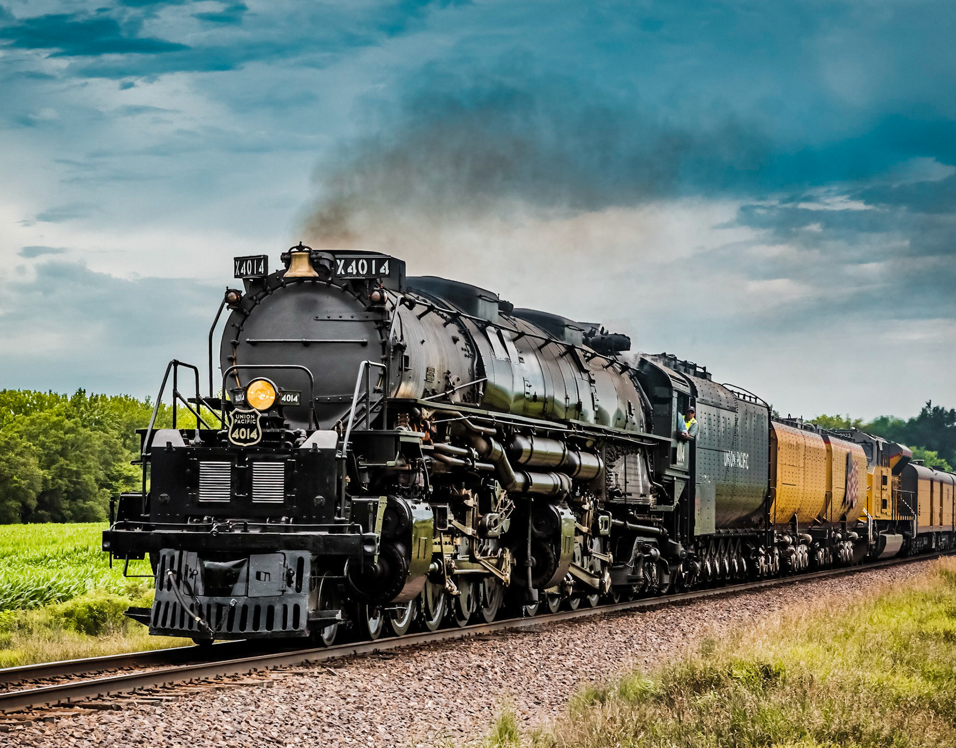 Restored Union Pacific BigBoy Steam Engine  4014 travels south across the Iowa countryside.