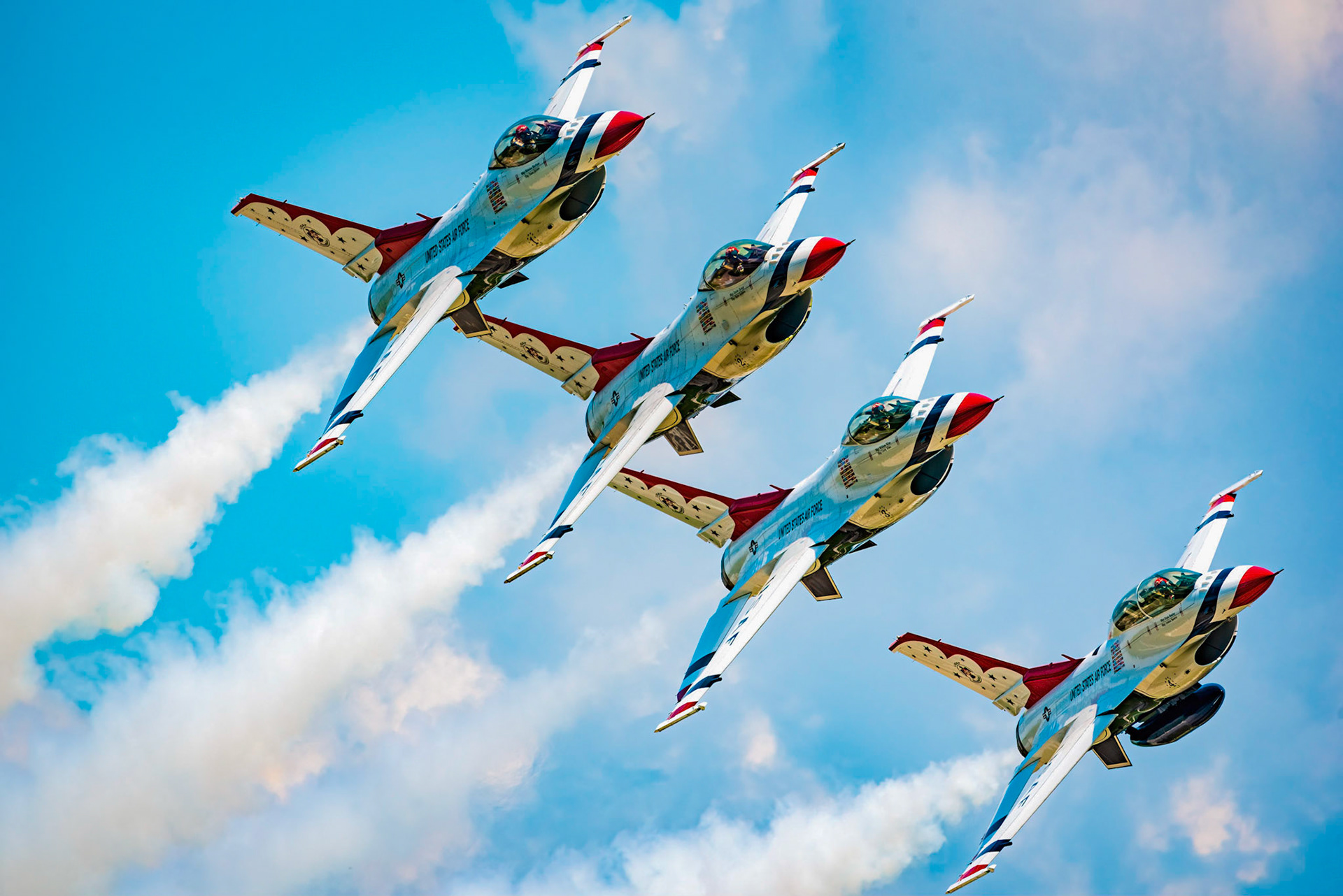 The 2021 USAF Thunderbirds Delta formation flying during an airshow.