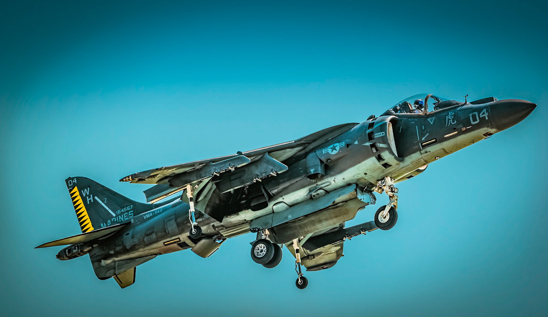 An USMC Harrier jet takes off.