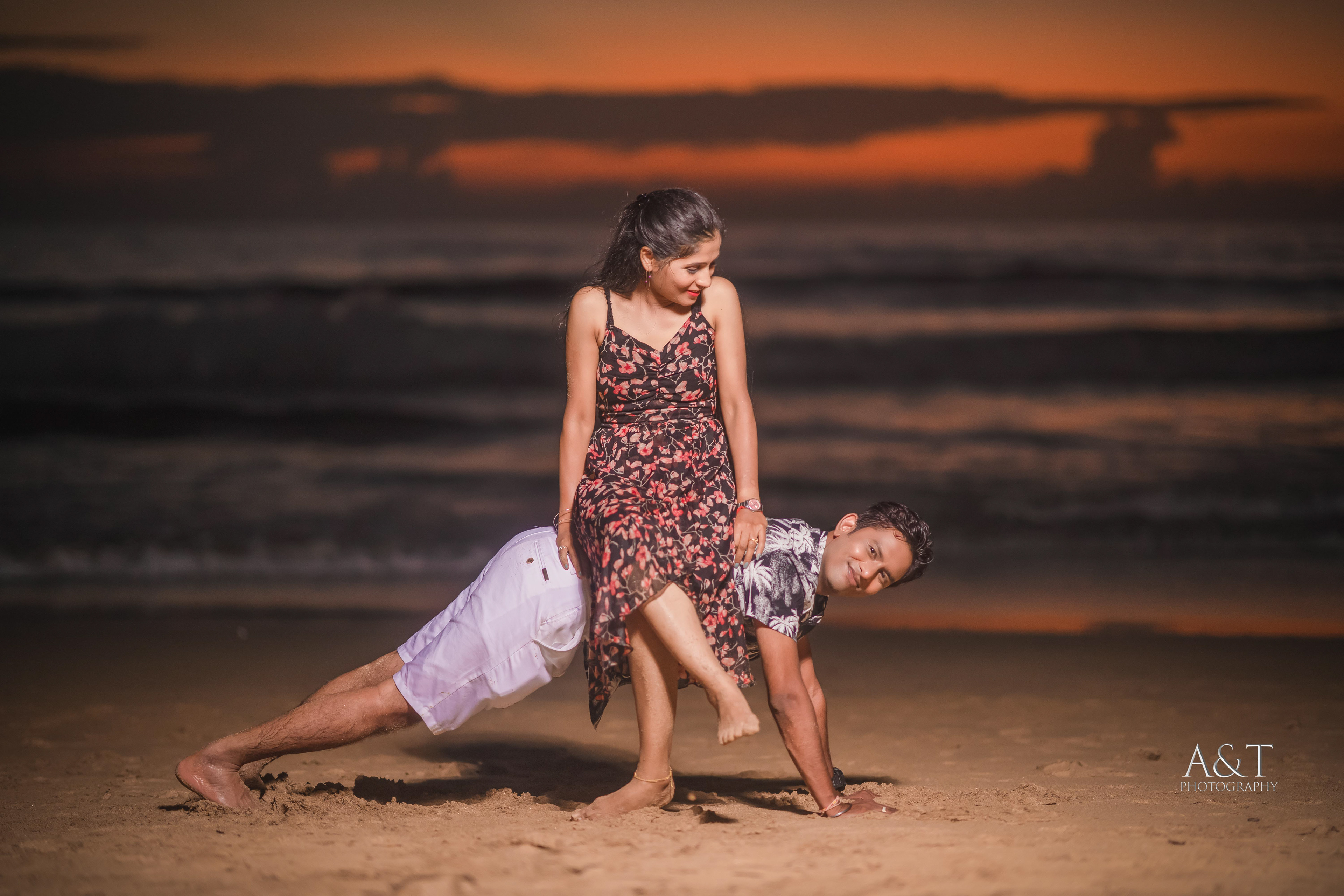 Sanket & Komal having playful moment at their Pre-wedding in Goa| This image is captured by the best photographer in Goa
