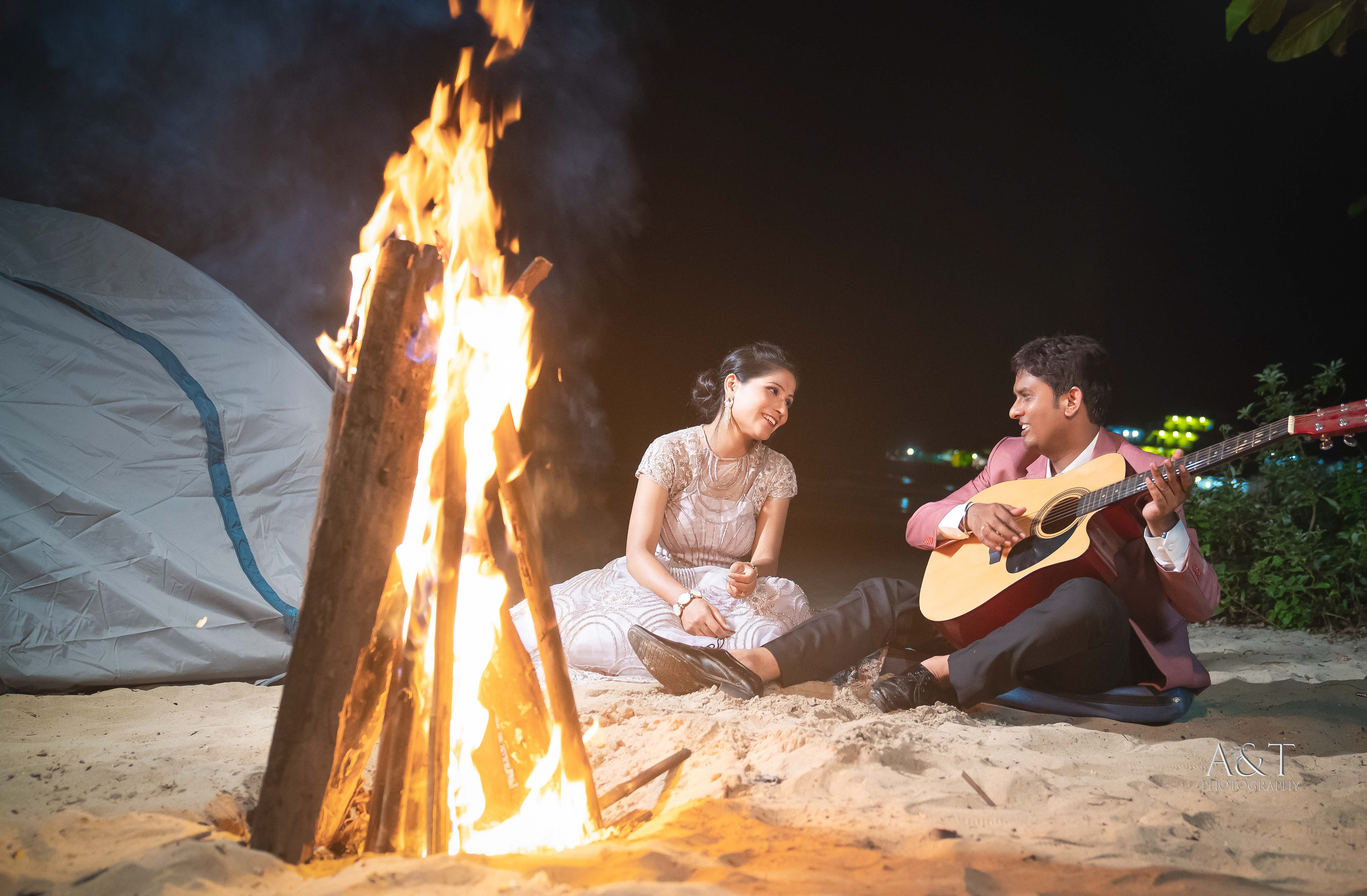 Intimate pre-wedding bonfire - Sanket and Komal enjoy a cozy evening under the stars| Amazing image captured by Top Wedding Photographer in Goa