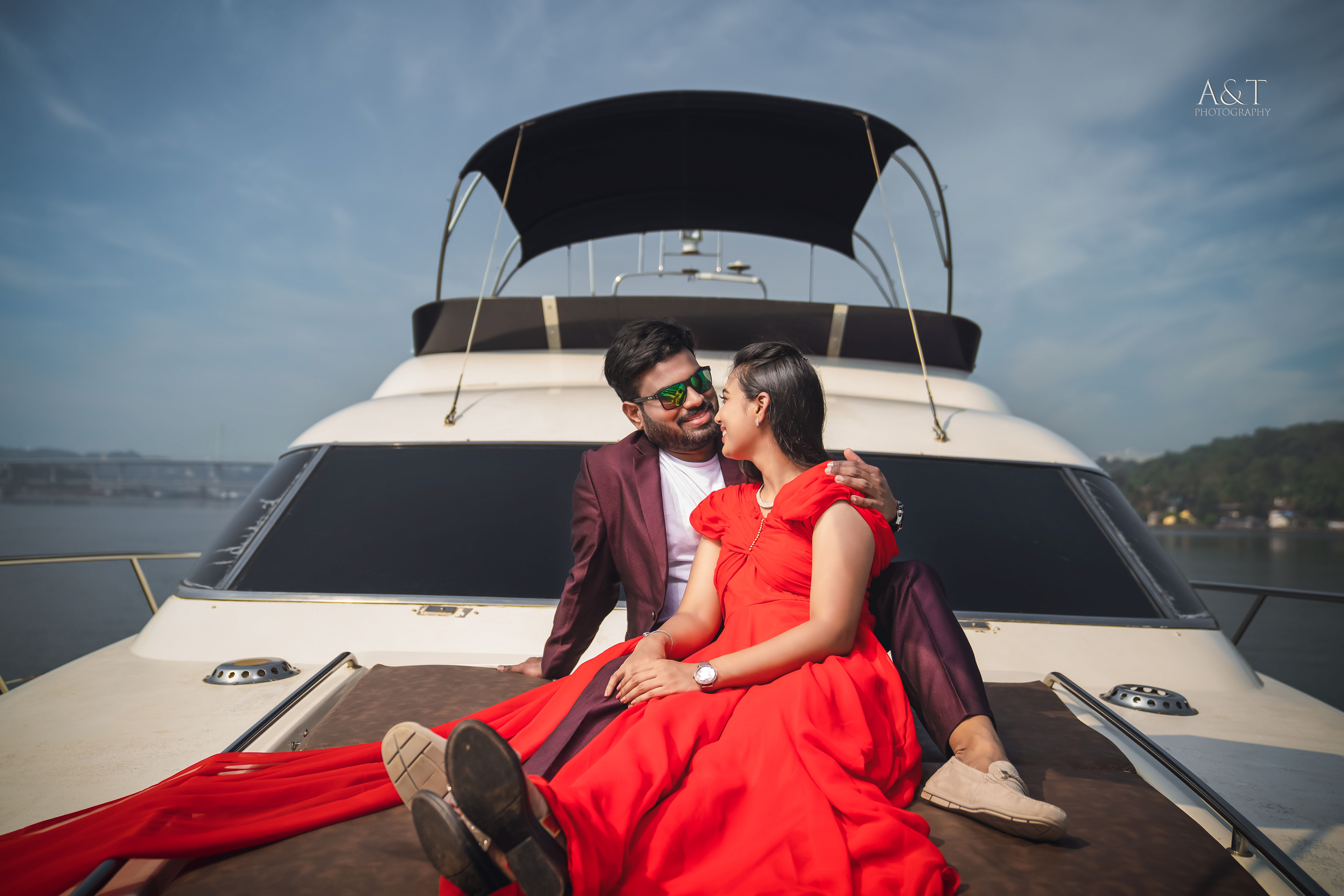 Romantic pre-wedding moment captured by A&T Photography on yacht at Goa