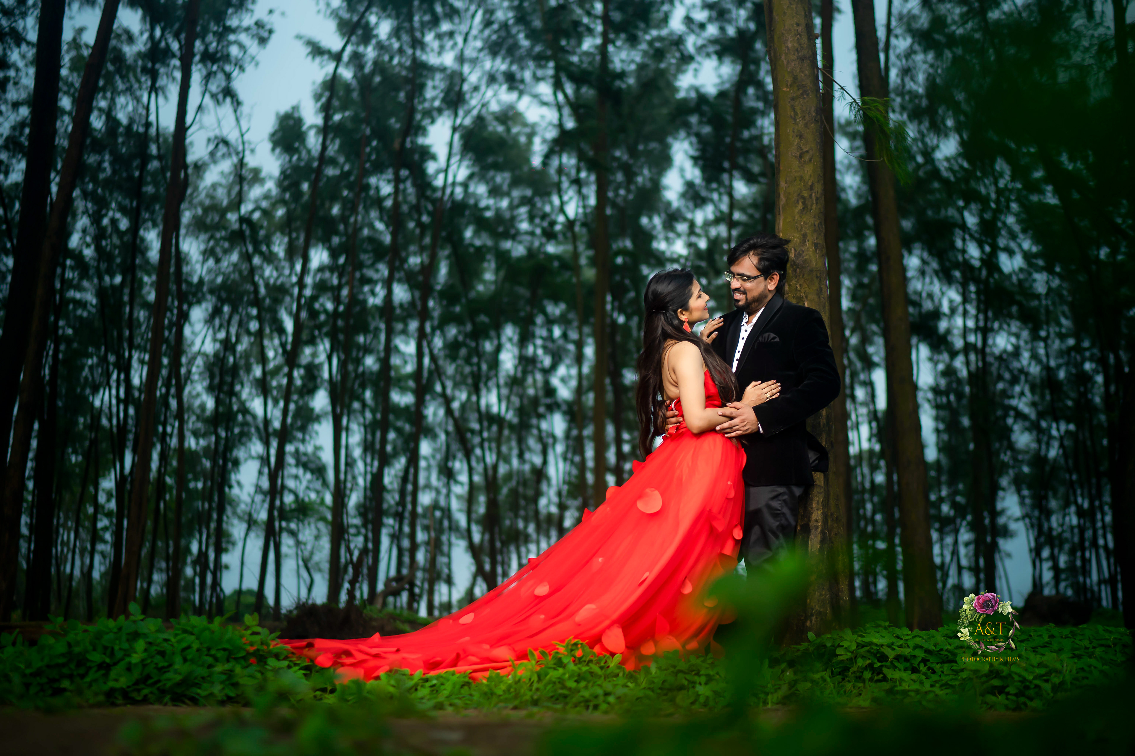 Lush Green Backgrounds at Monsoon Pre-wedding Photoshoot by A&T Photography where couple is looking amazing