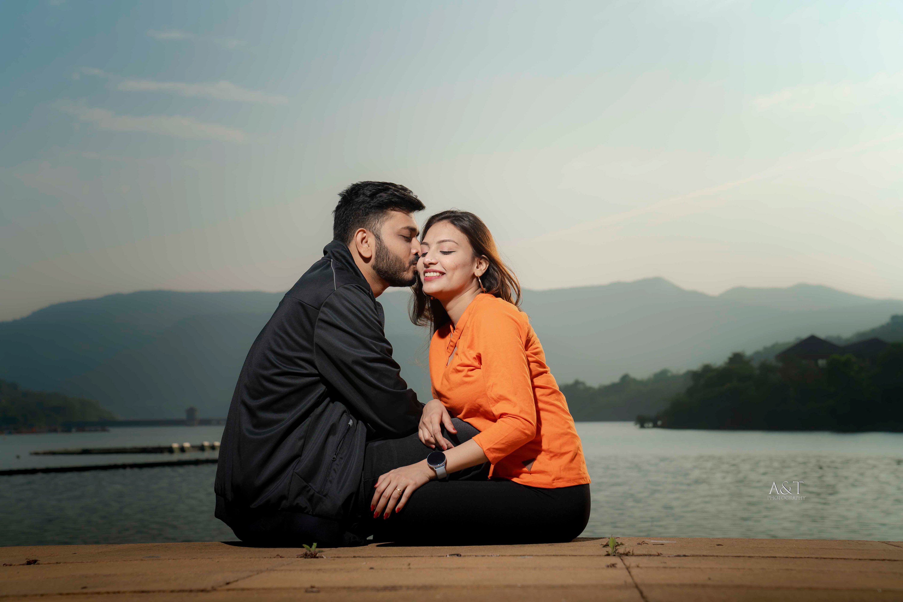 Romantic Couple Picture near lake at Lavasa City captured by A&T Photography during a pre-wedding photoshoot