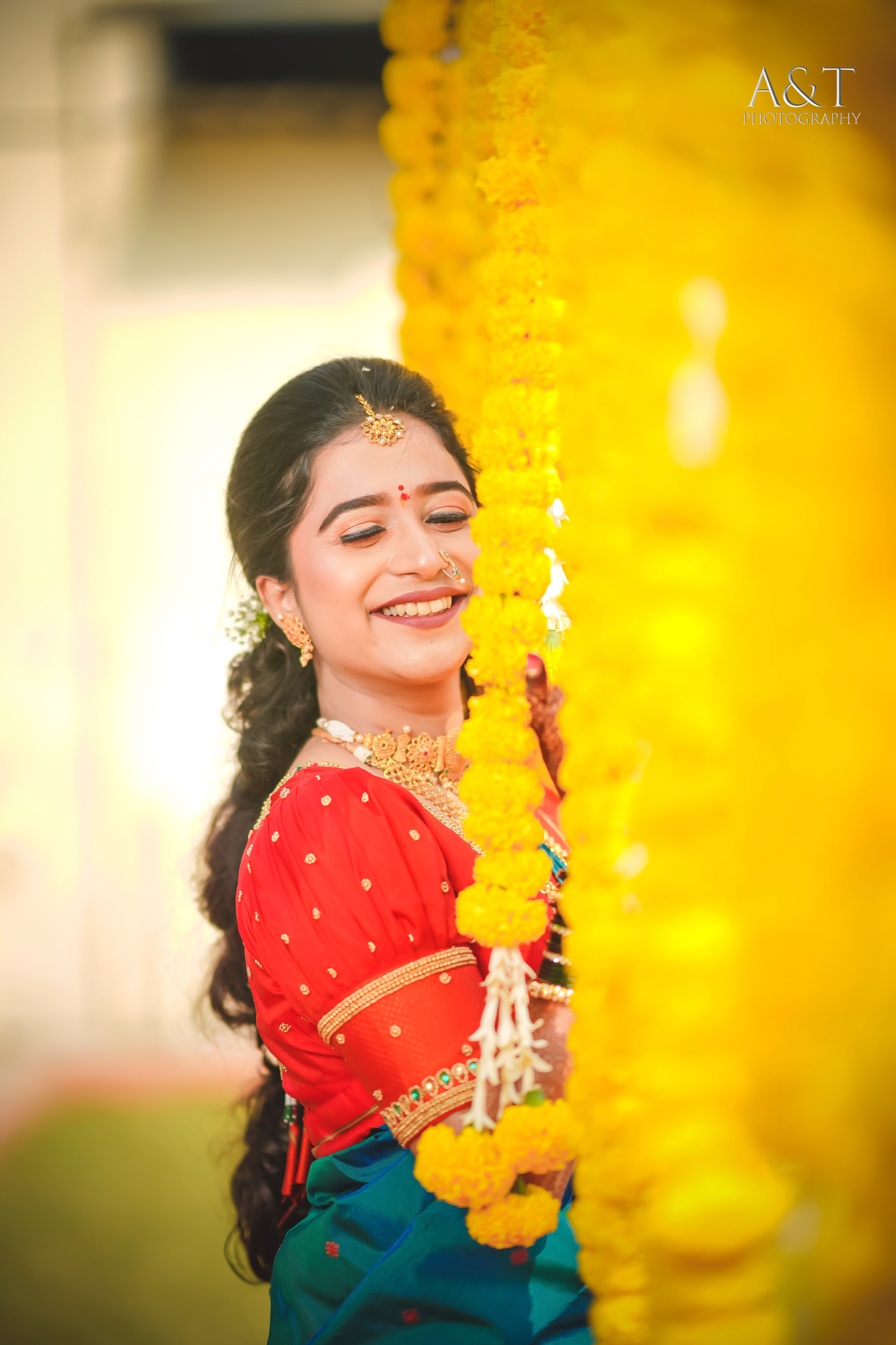 Bride's portrait showcasing exquisite bridal makeup and elegant hairstyle.
