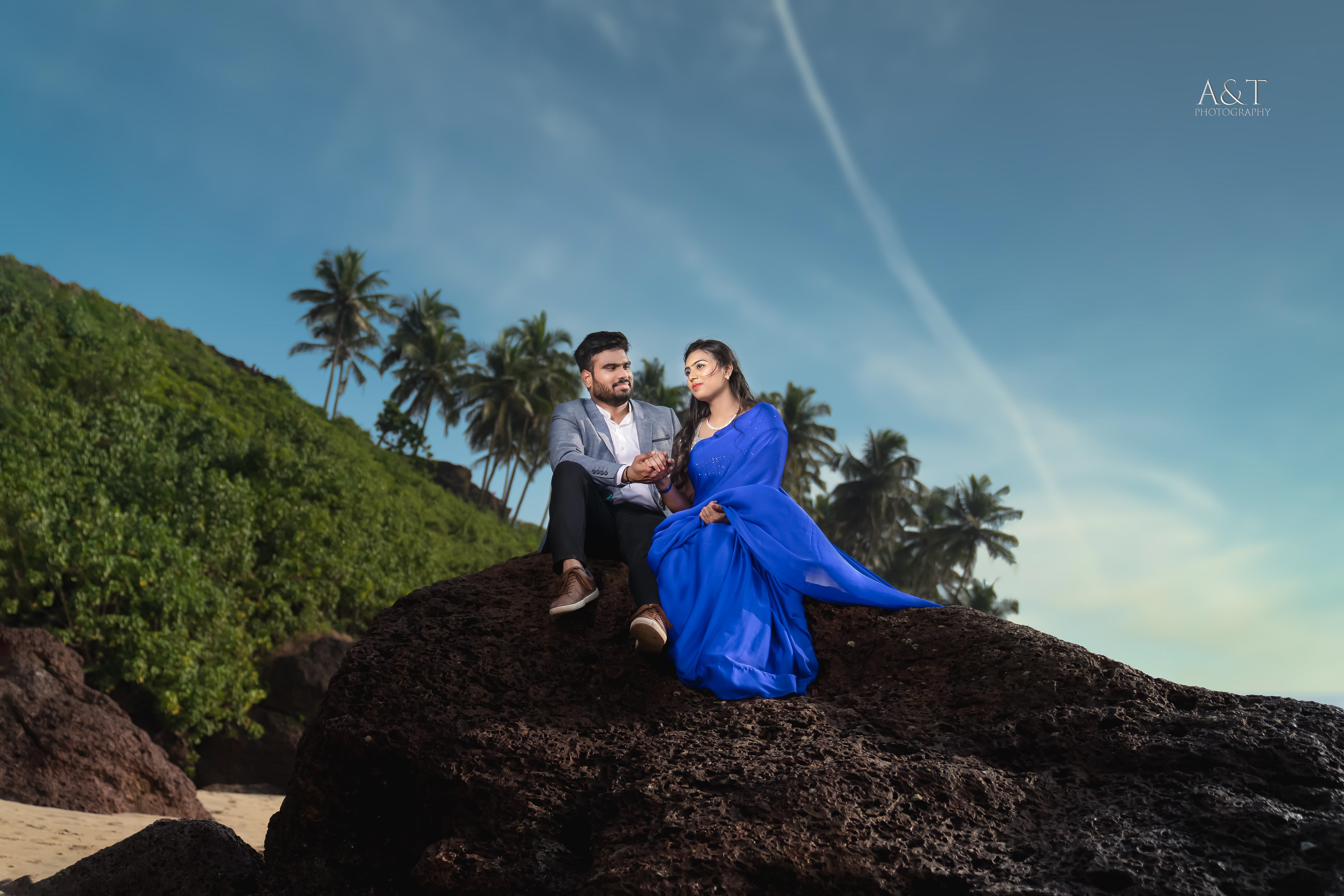 Santosh and Manasvi wearing beautiful outfits on Serene Beach of Goa. This amazing image is captured by A&T Photography