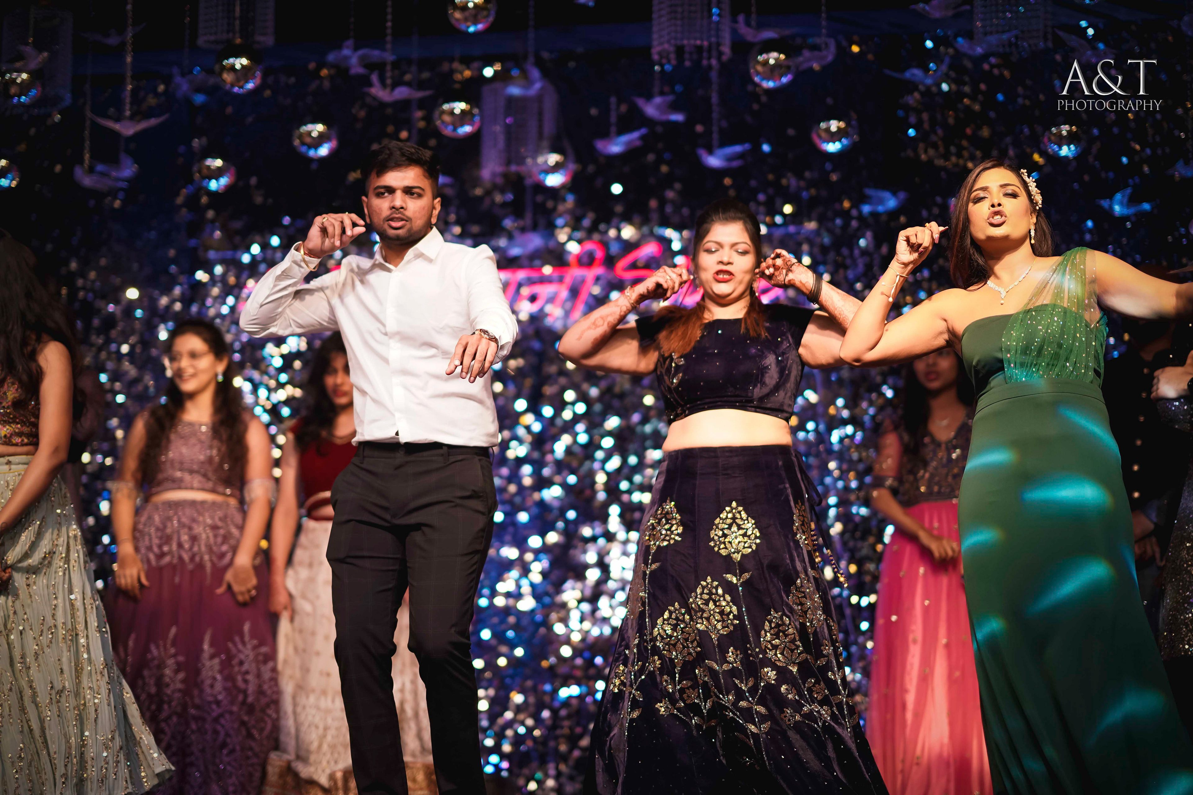Sangeet Fun captured by Best Destination wedding photographer