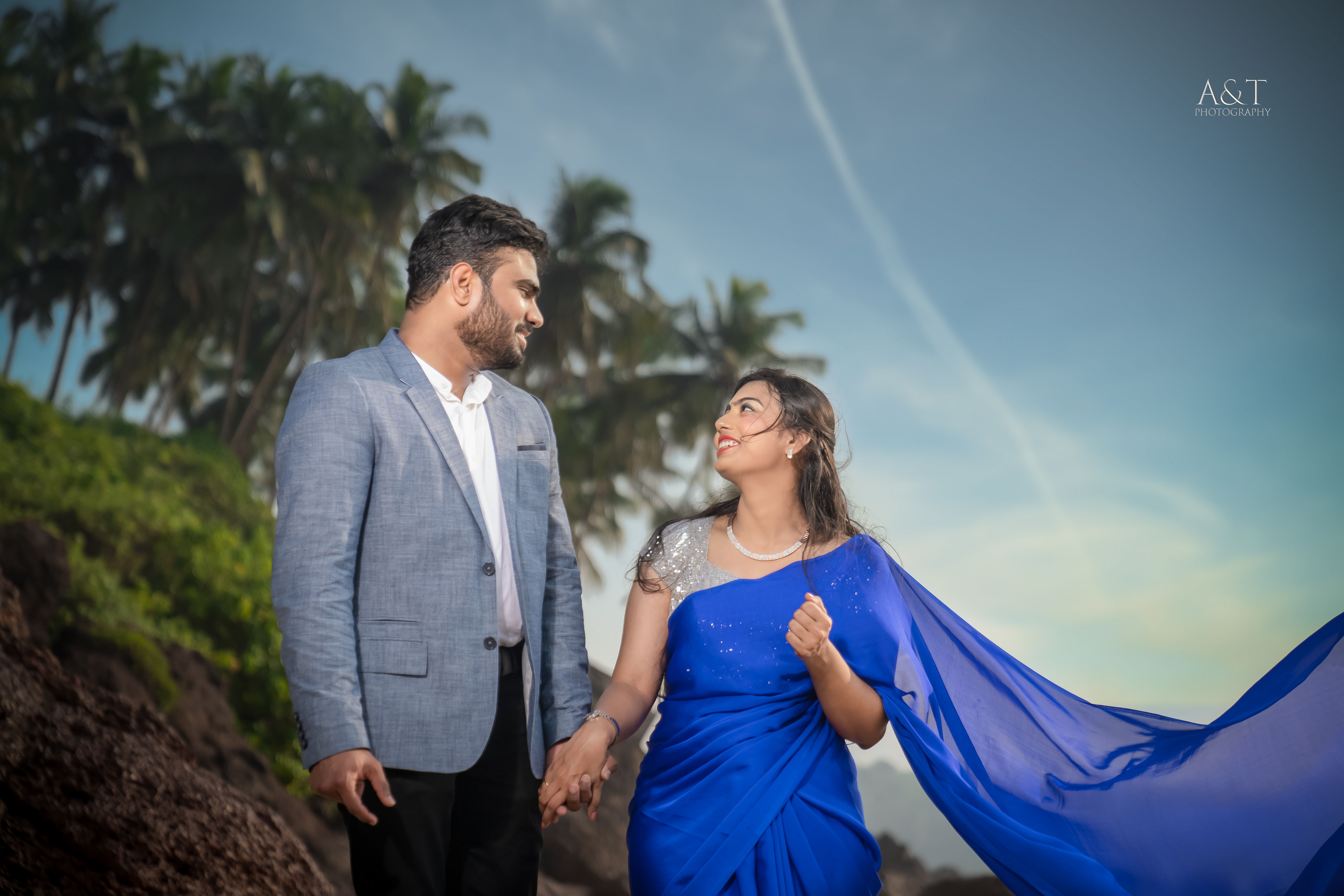 Santosh and Manasvi walking on beach beautifully captured by A&T Photography
