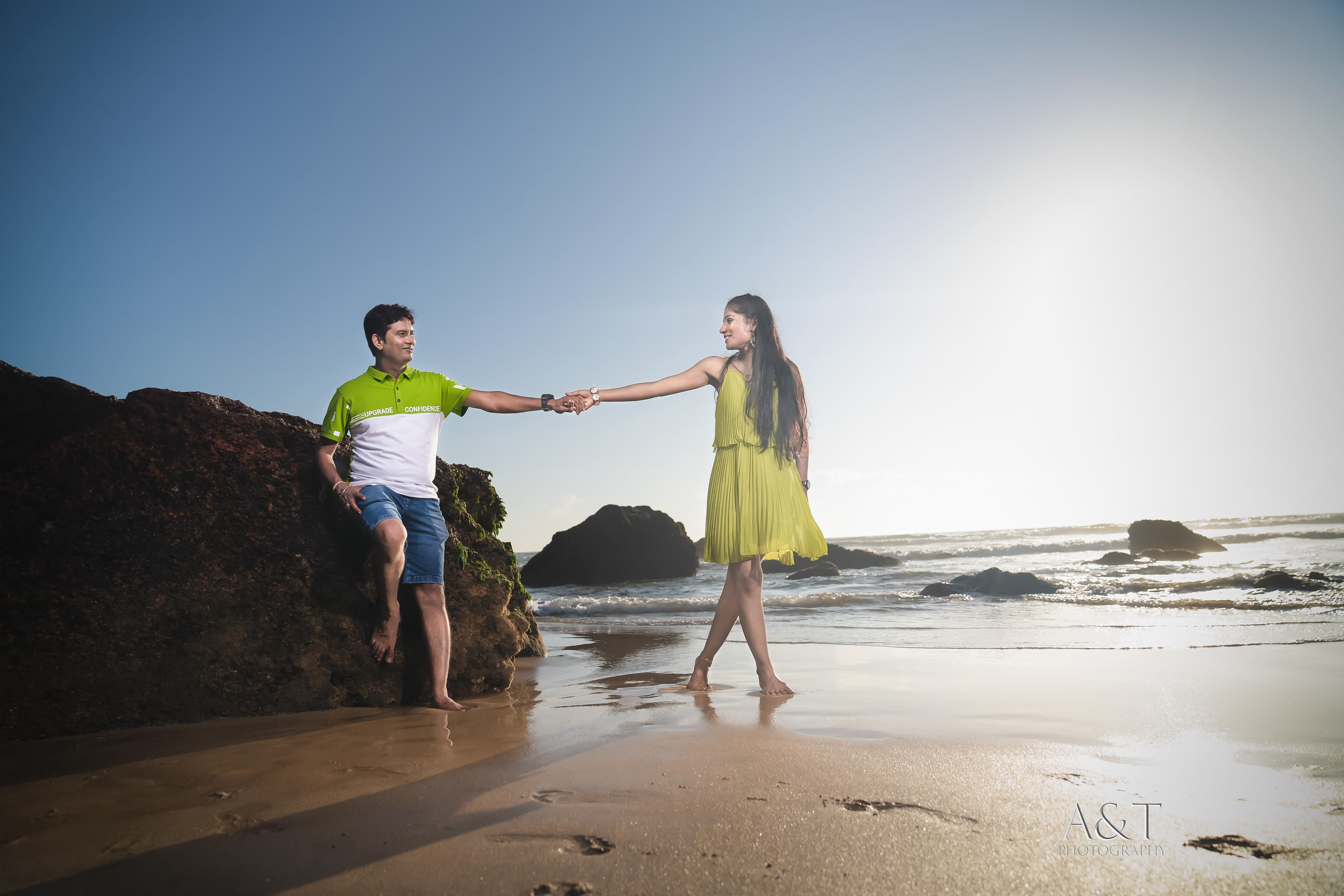 Playful pre-wedding moment on Goa's lively beach | Captured by Best Wedding Photographer in Goa