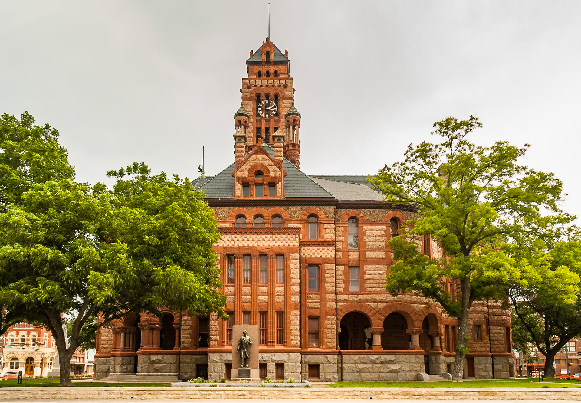 The Ellis County Courthouse in Waxahachie is perhaps Texas most iconic courthouse. Constructed in 1897 and renovated in 2002, the courthouse is one of a number designed by architect J. Riely Gordon in the Richardsonian Romanesque style. The facade is constructed primarily of Burnet County red granite and Pecos red sandstone. This is the southwest face of the courthouse.Date: 1 January 2009Location: Waxahachie, Texas, United StatesOriginal resolution: 6 MPProcessing: Processed from RAW using Adobe Photoshop Lightroom CC 2015