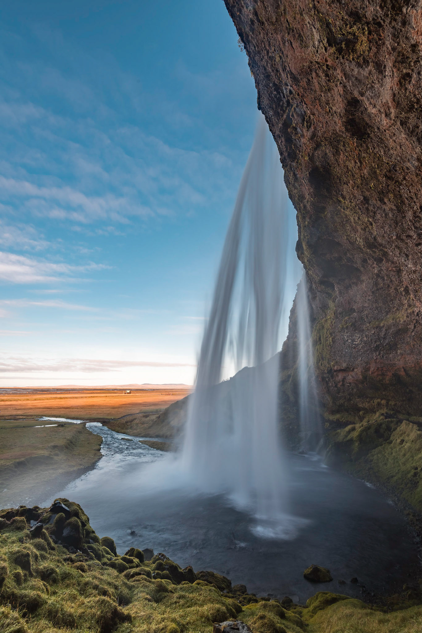 Seljalandsfoss is an almost 200-ft waterfall that flows off the glacier-covered volcano Eyjafjallajökull, which famously erupted in 2010, bringing air traffic in Europe to a halt. The spray from the falls is tremendous (and cold), so taking a photo here requires constant attention to keeping the camera lens dry. In this photo, I used a three-stop neutral density filter to smooth the water.Date: 16 October 2017Location: IcelandOriginal resolution: 36 MPProcessing: Processed in high dynamic range from RAW using Adobe Photoshop Lightroom 6
