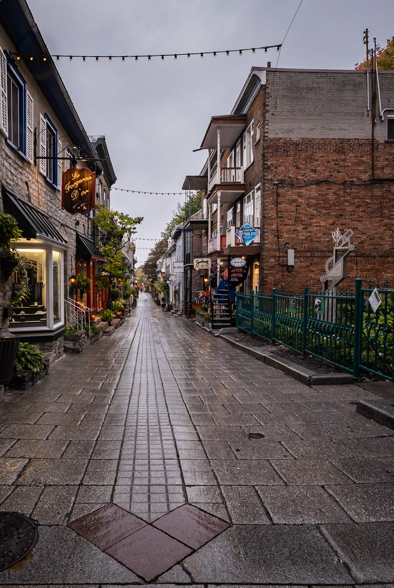 Here's another view of Rue du Petit Champlain. I think the pattern of the paving stones makes a nice leading line to the vanishing point of the street.  Date: 7 October 2018Location: Québec, Québec, CanadaOriginal resolution: 36 MPProcessing: Processed from RAW using Adobe Photoshop Lightroom Classic CC 8