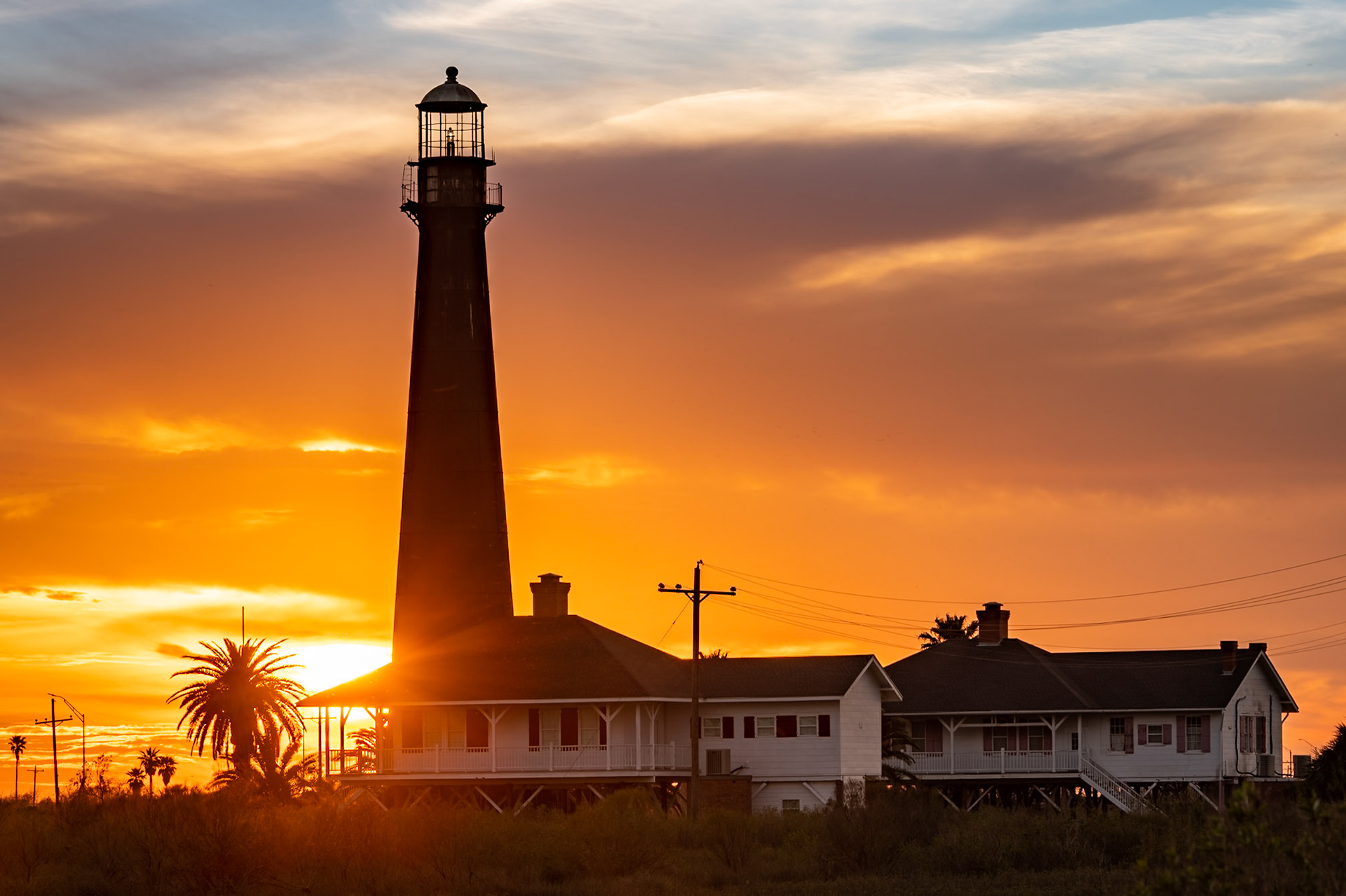We went out to Port Bolivar to photograph the 2020 planetary conjunction of Jupiter and Saturn as a backdrop to the lighthouse. As luck would have it, the sunset lit up the clouds while we waited, providing a bonus photo for the day | Date: 22 December 2020 | Location: Port Bolivar, Texas, United States | Original resolution: 45 MP | Processing: Processed from RAW using Adobe Photoshop Lightroom Classic 9