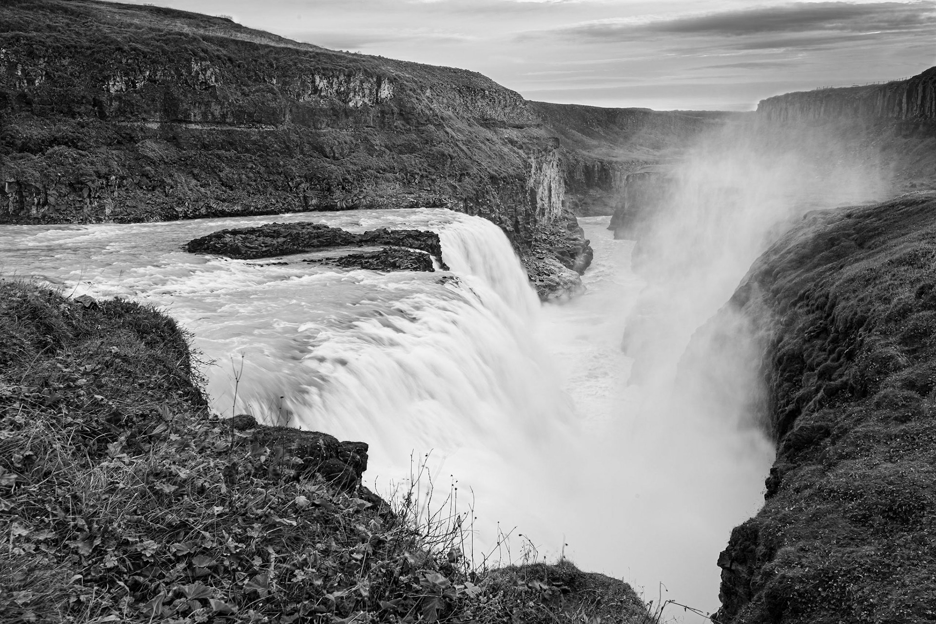 Gulfoss is a famous set of falls on the glacier-fed Ölfusá River. The falls are one of the key stops of the Golden Circle tour of Iceland. The terrain around Gulfoss is a bit monochromatic, so I decided this image might be better in black and white.Date: 17 October 2017Location: IcelandOriginal resolution: 36 MPProcessing: Processed from RAW using Adobe Photoshop Lightroom 6