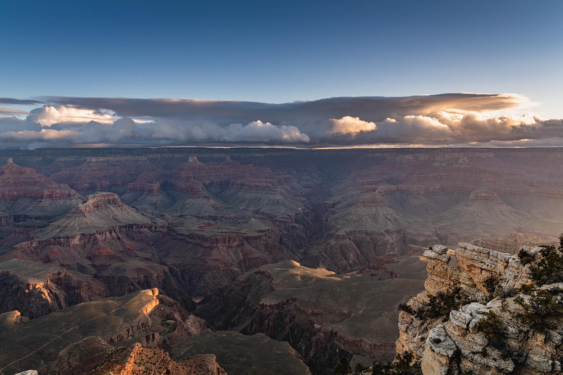 Our last day at Grand Canyon, I went out to photograph the morning light at Yavapai Point. I noticed this cloud formation, which I believe is stratocumulus lenticularis, growing over the north rim. I photographed it with the line of Bright Angel Canyon leading out to it.Date: 18 March 2020Location: Grand Canyon National Park, Arizona, United StatesOriginal resolution: 45 MPProcessing: Processed from RAW using Adobe Photoshop Lightroom Classic 9