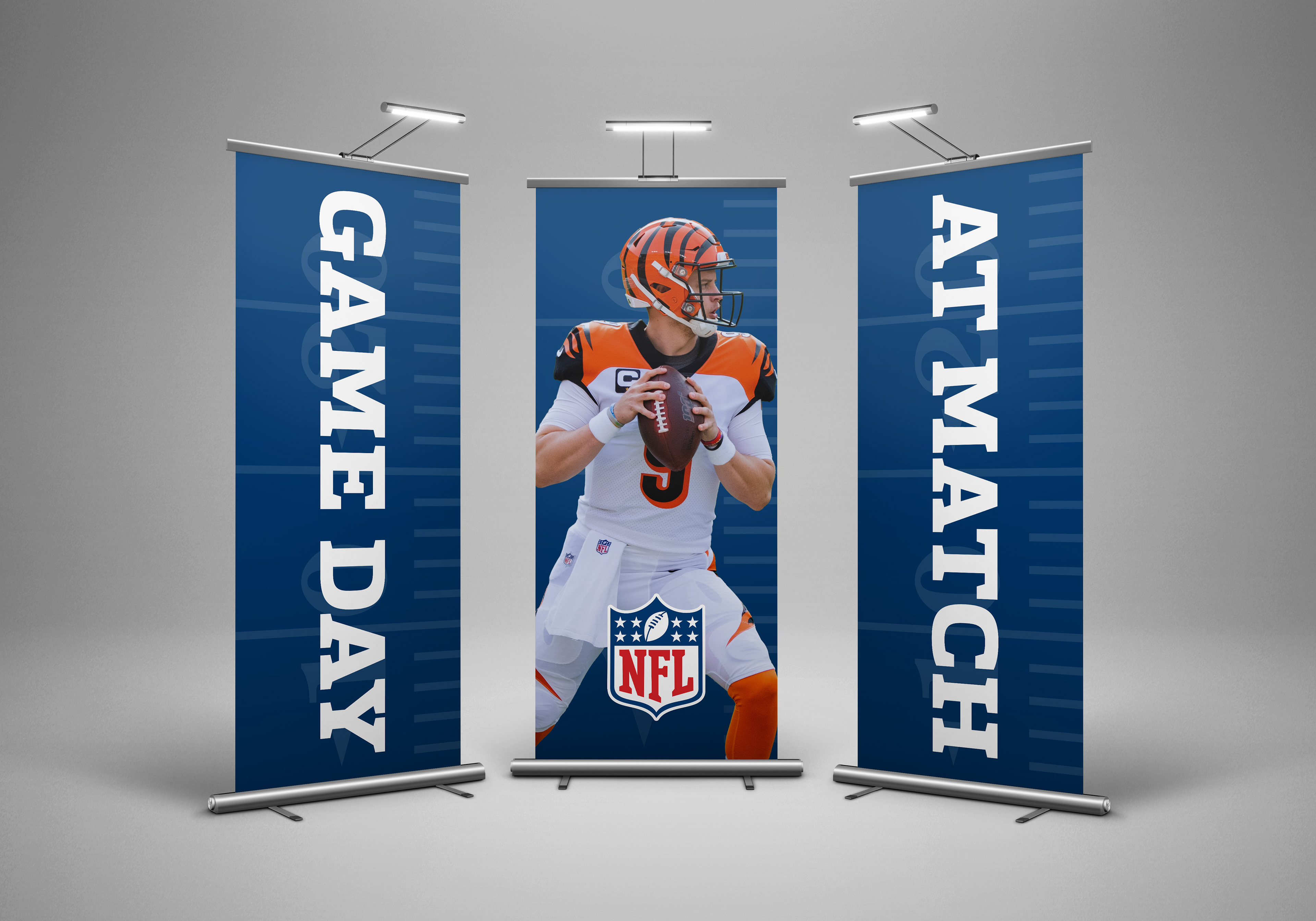 Three-panel pop-up banner display reading "Game Day at Match" with a Cincinnati Bengals quarterback center panel