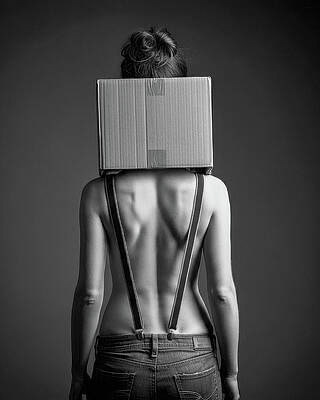Cardboard box with suspenders. Surreal Metaphor by © Bob Orsillo - All Rights Reserved