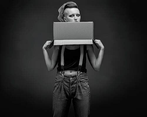 Mystery Unveiled a box open at the bottom symbolizes the unveiling of hidden aspects of identity. Surreal Metaphor by © Bob Orsillo - All Rights Reserved