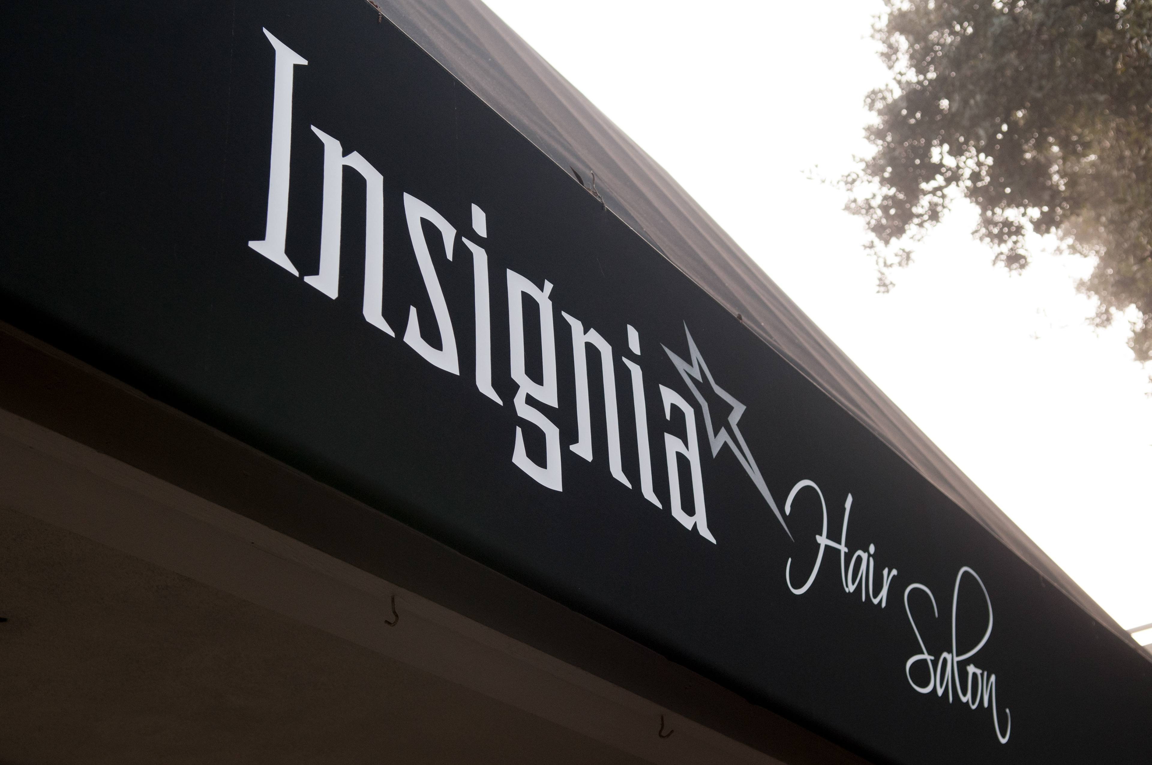 Insignia Hair Salon branded awning