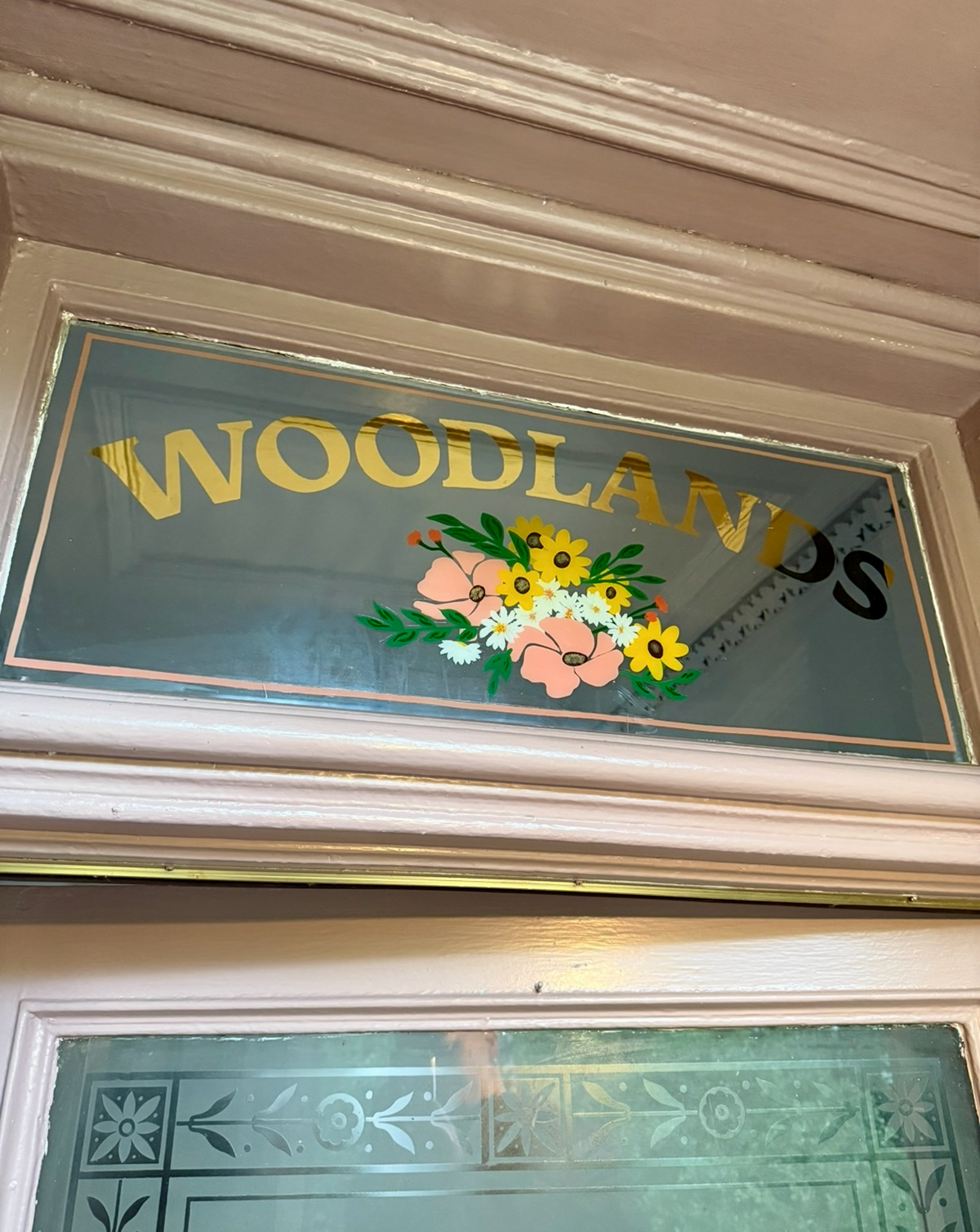 23 carat house name with floral detail