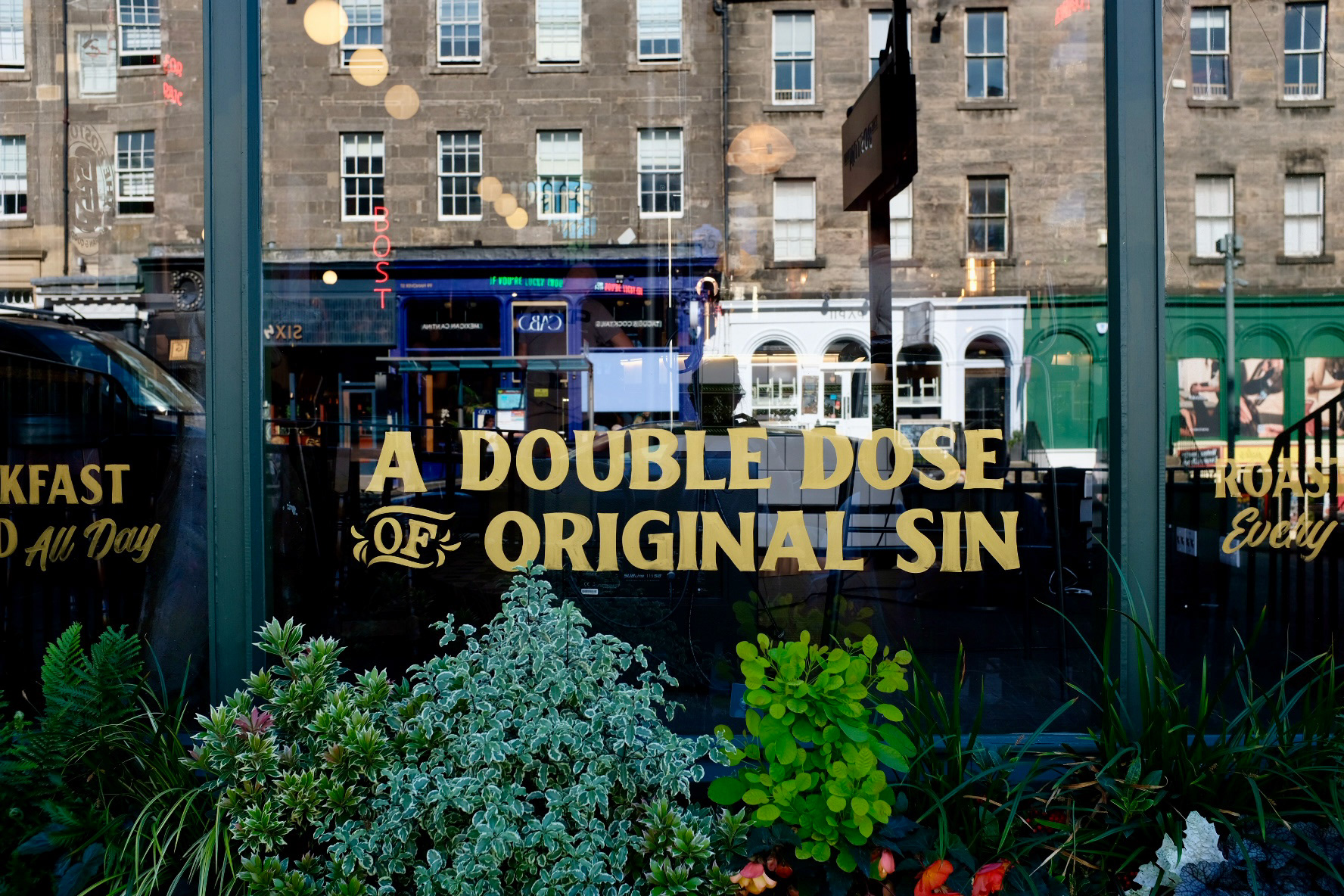 Aged gold paint windows designed and painted by Bungo Sign Co