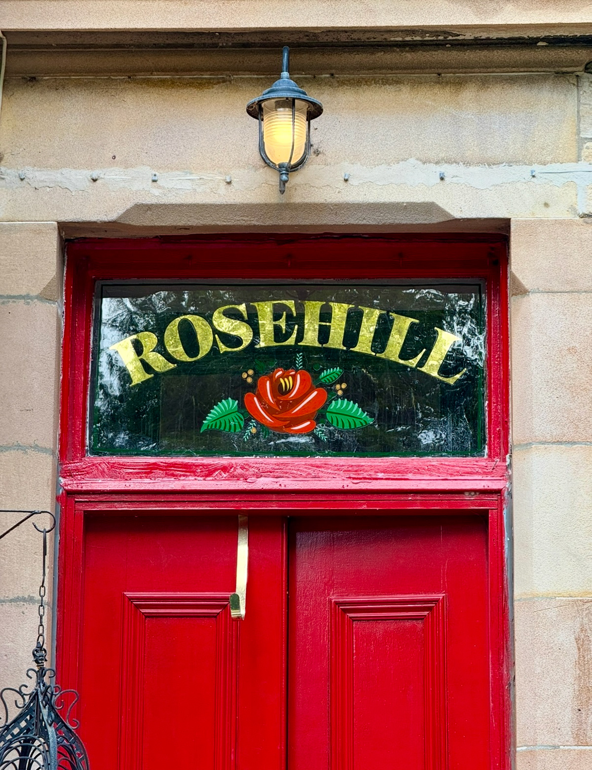23 carat house name with floral detail