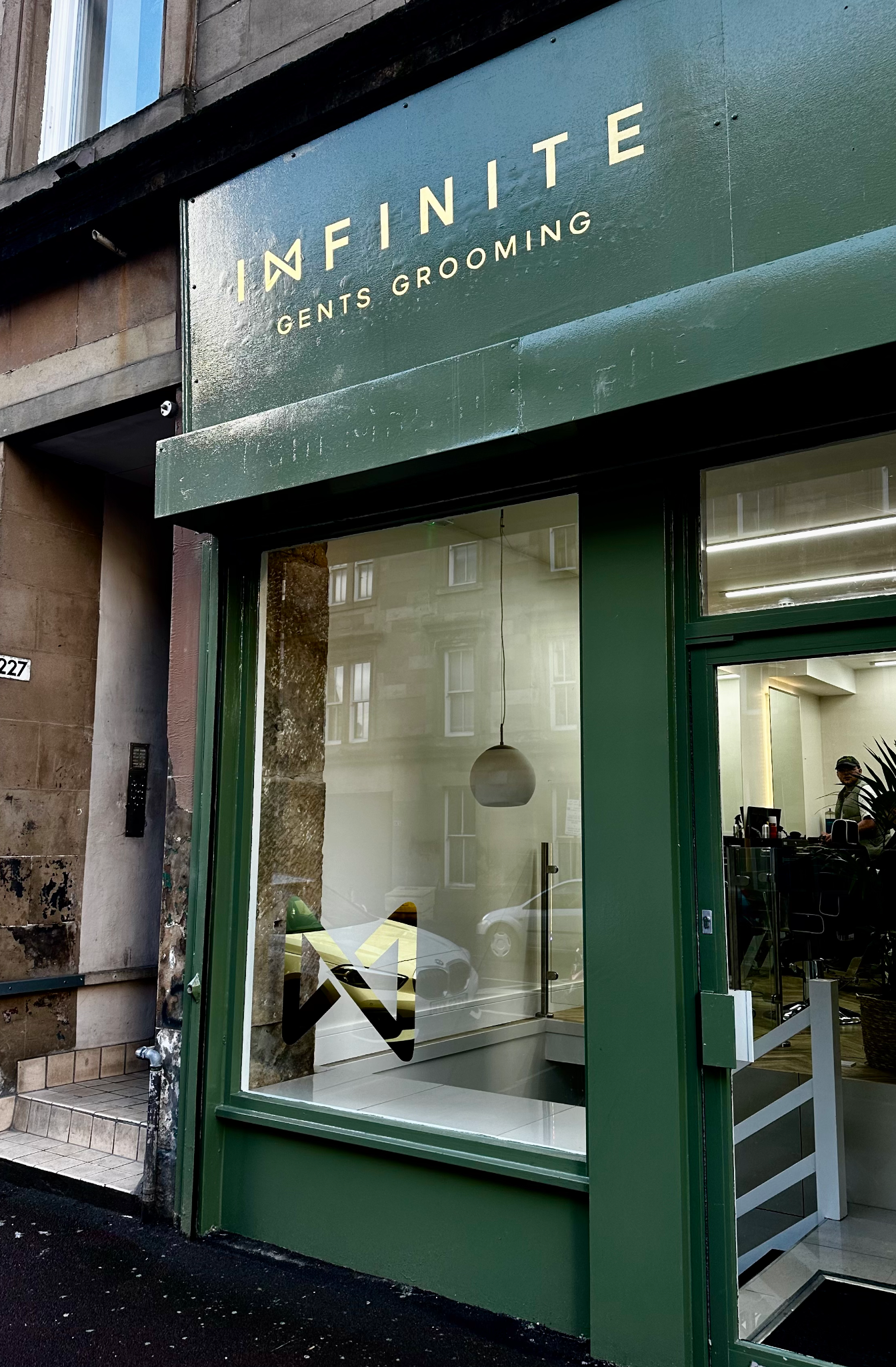 Surface gilded logo and mirror gilded window
