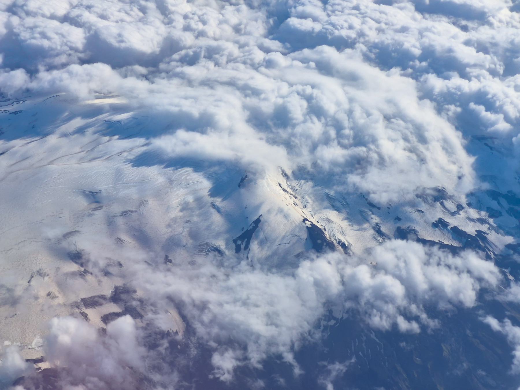 Depending on your approach or take-off, and your position on the plane, Katla can be spotted when you approach or leave Keflavik International Airport.