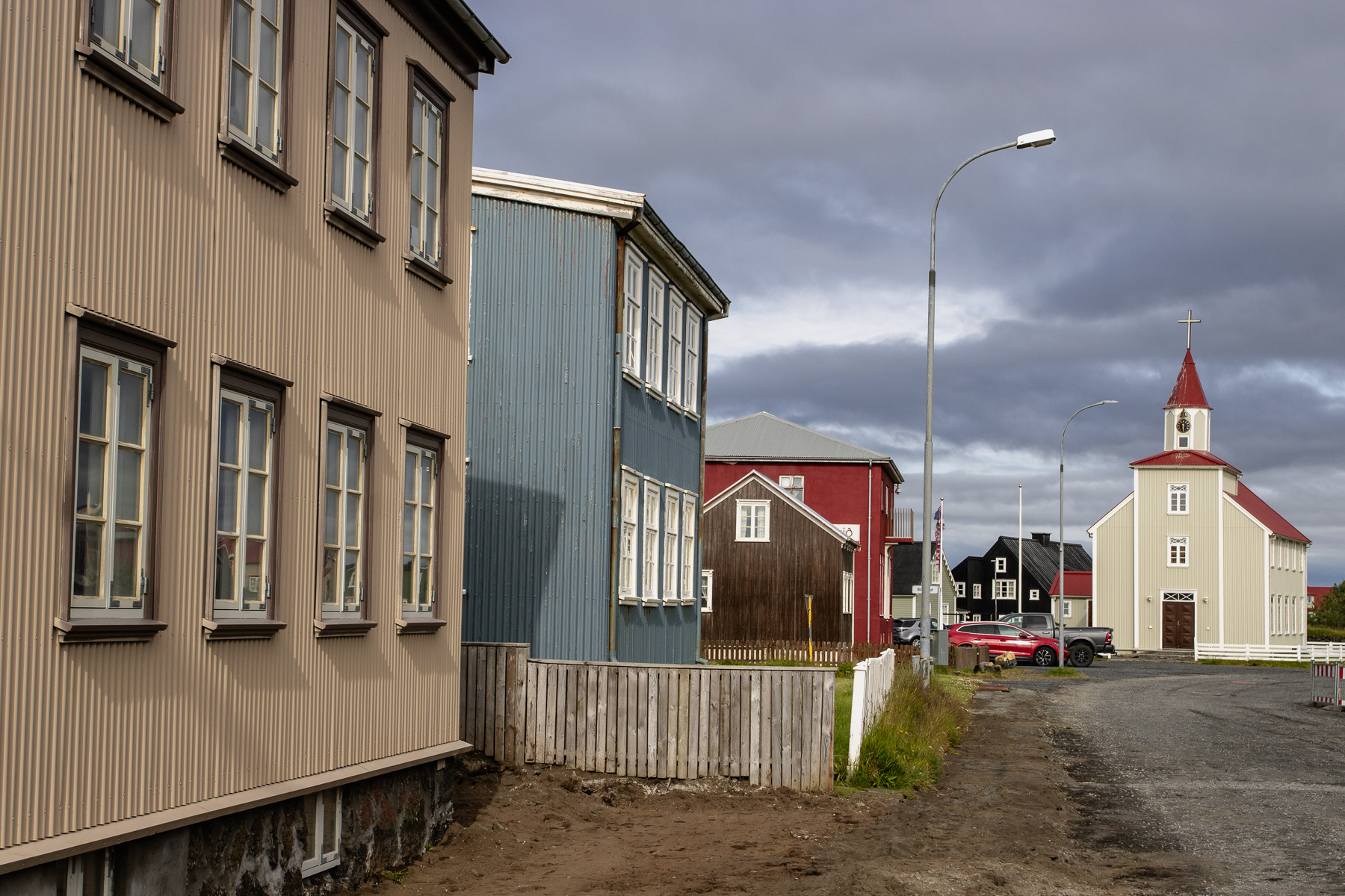 Part of the main street of Eyrarbakki, with the church.