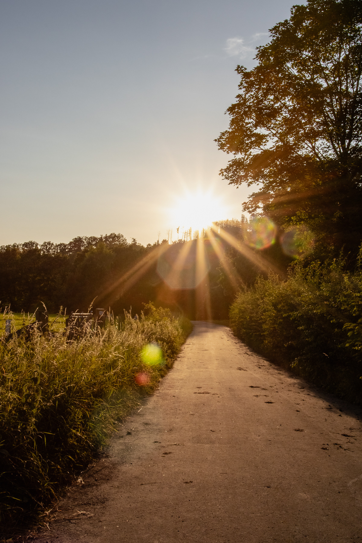 The sun sets slowly over the landscape.