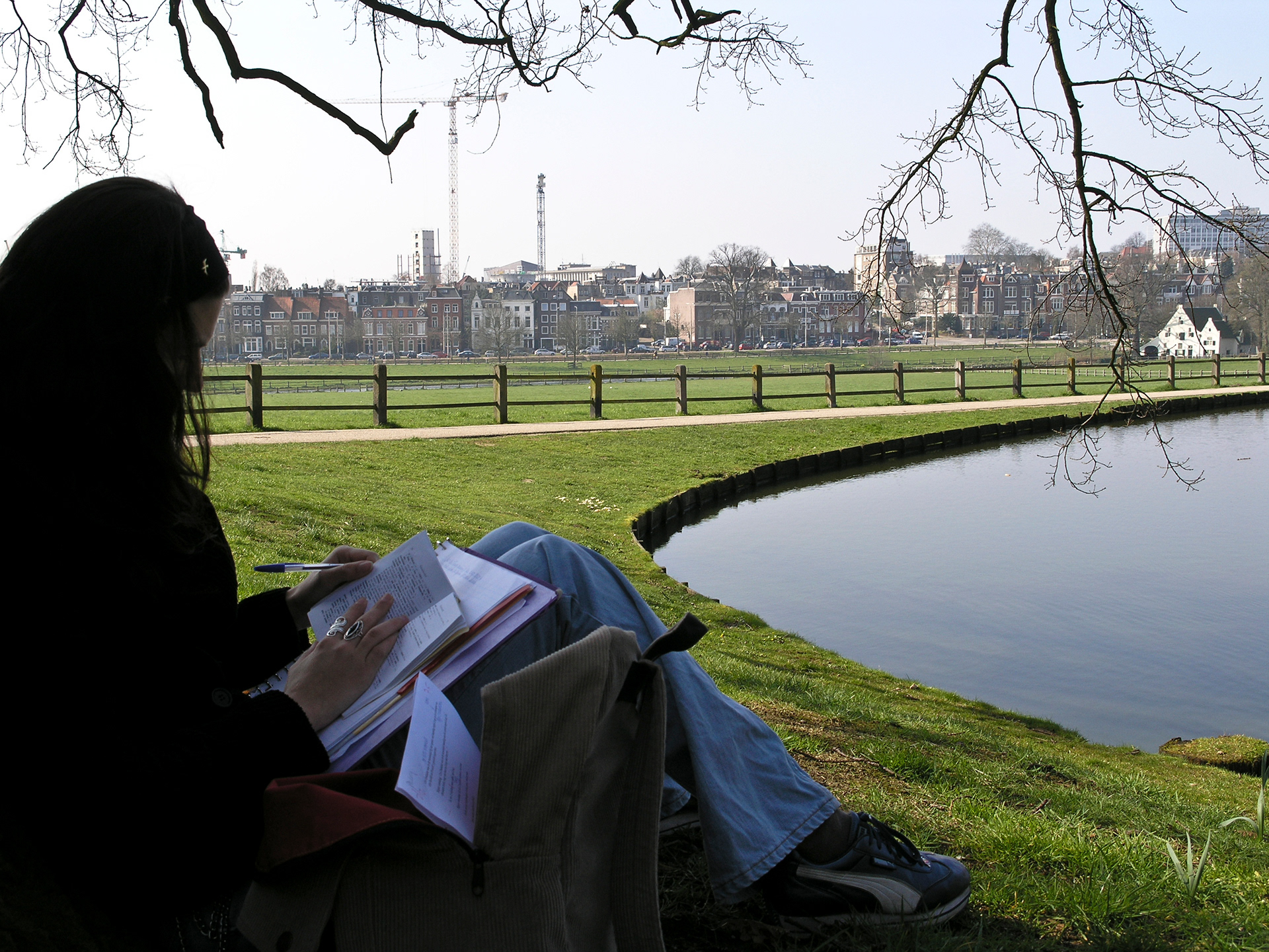 A young lady doing homework in Park Sonsbeek, May 2004