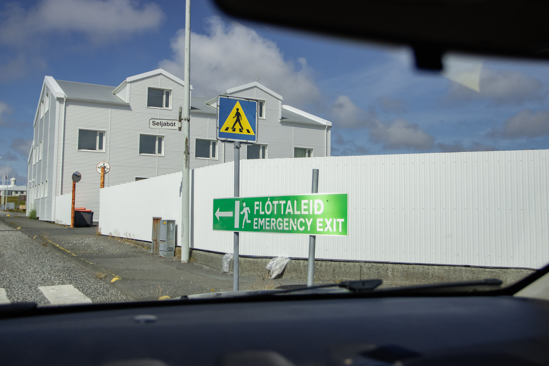 Big and clear emergency exit signs so with the next eruption those still remaining find the way quickly.