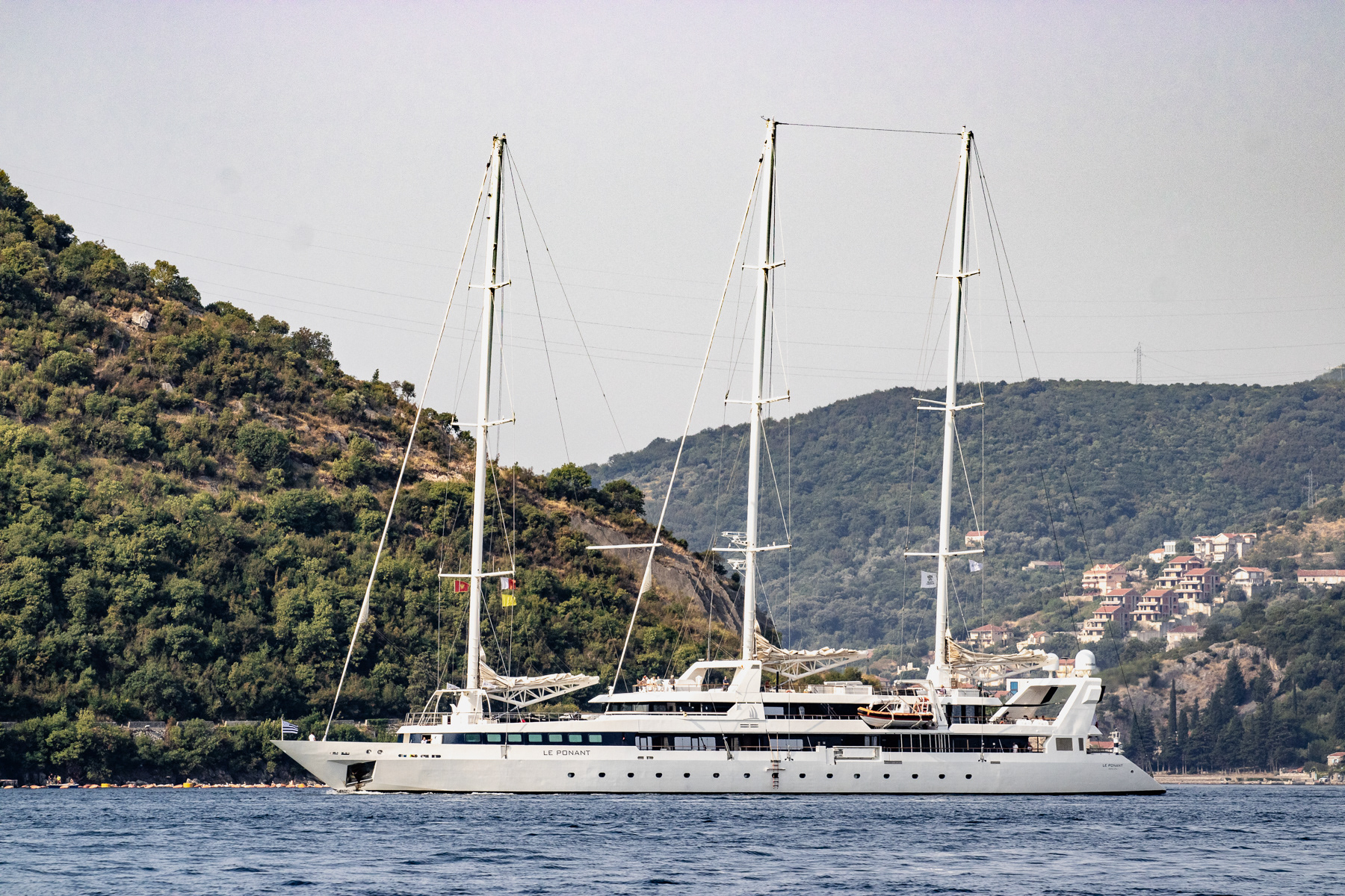 The French luxury sailing cruise ship Le Ponant passing through the bay of Kotor near Perast, August 2025.