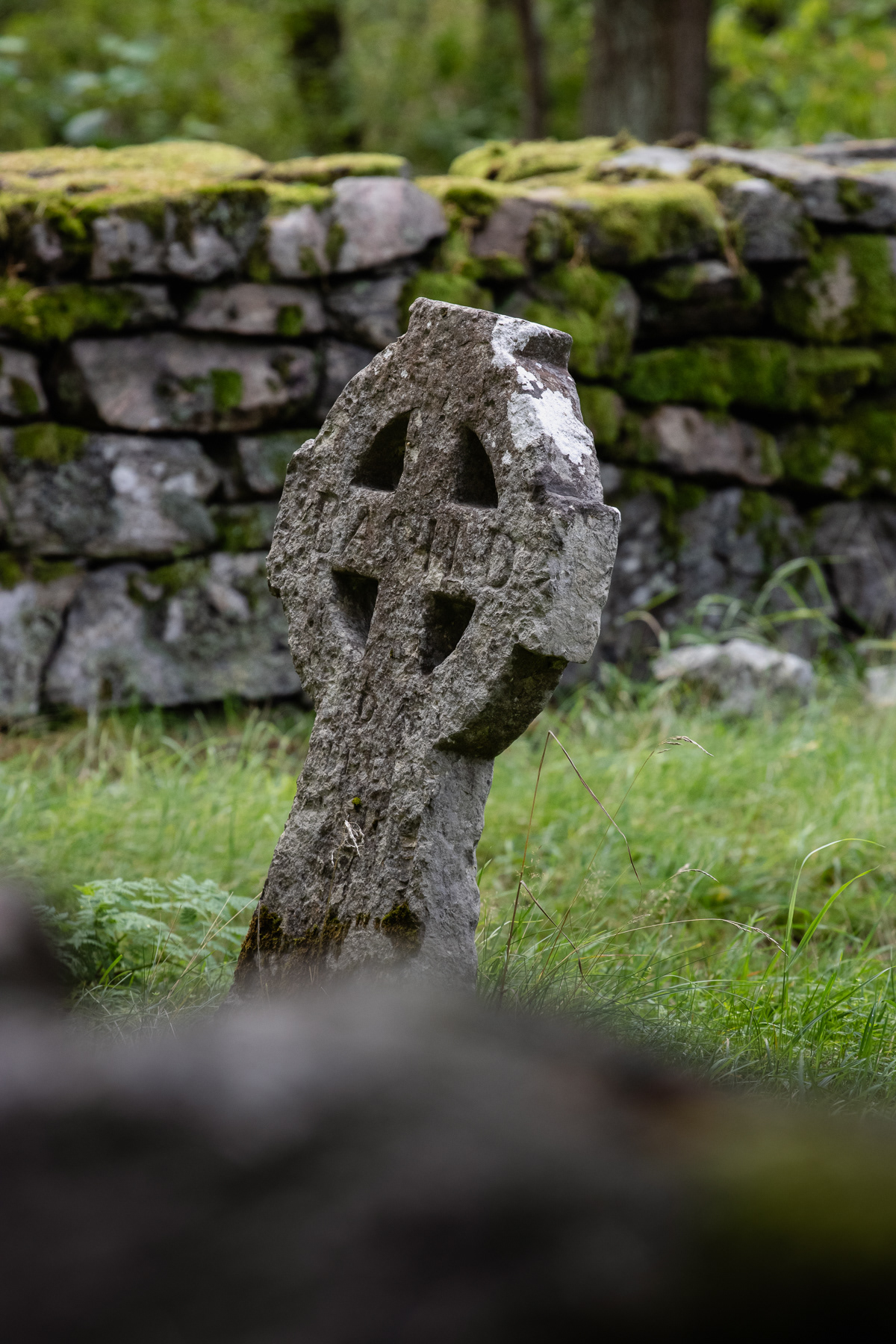 A grave stone at the church cemetary.