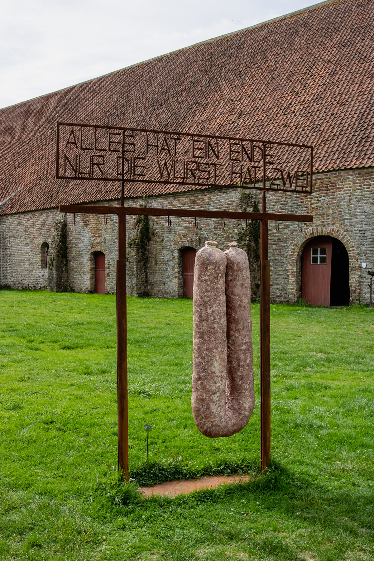 The sign of this installation reads in German: all has one end, a sausage has two.
