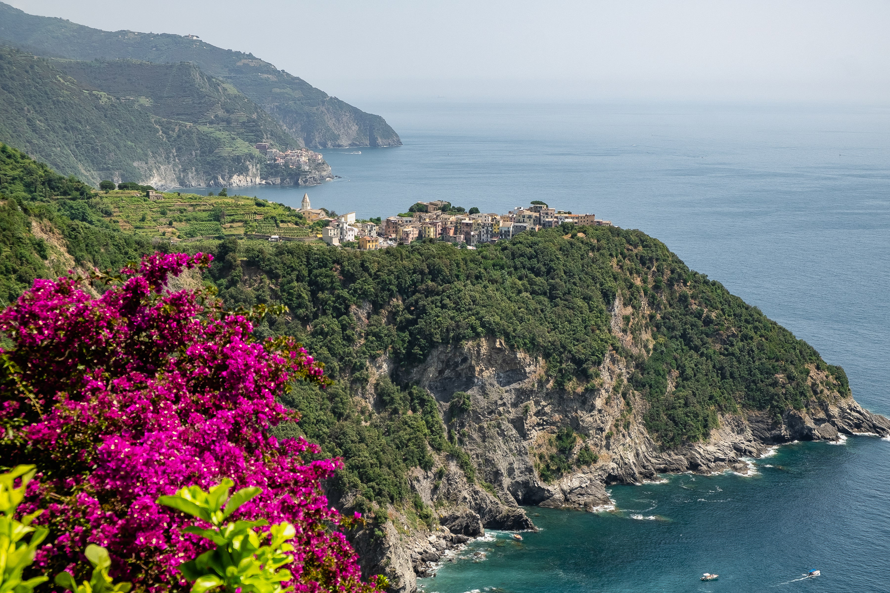 First sight of Corniglia on the trail coming from Vernazza. In the distance Manarola is already visible.
