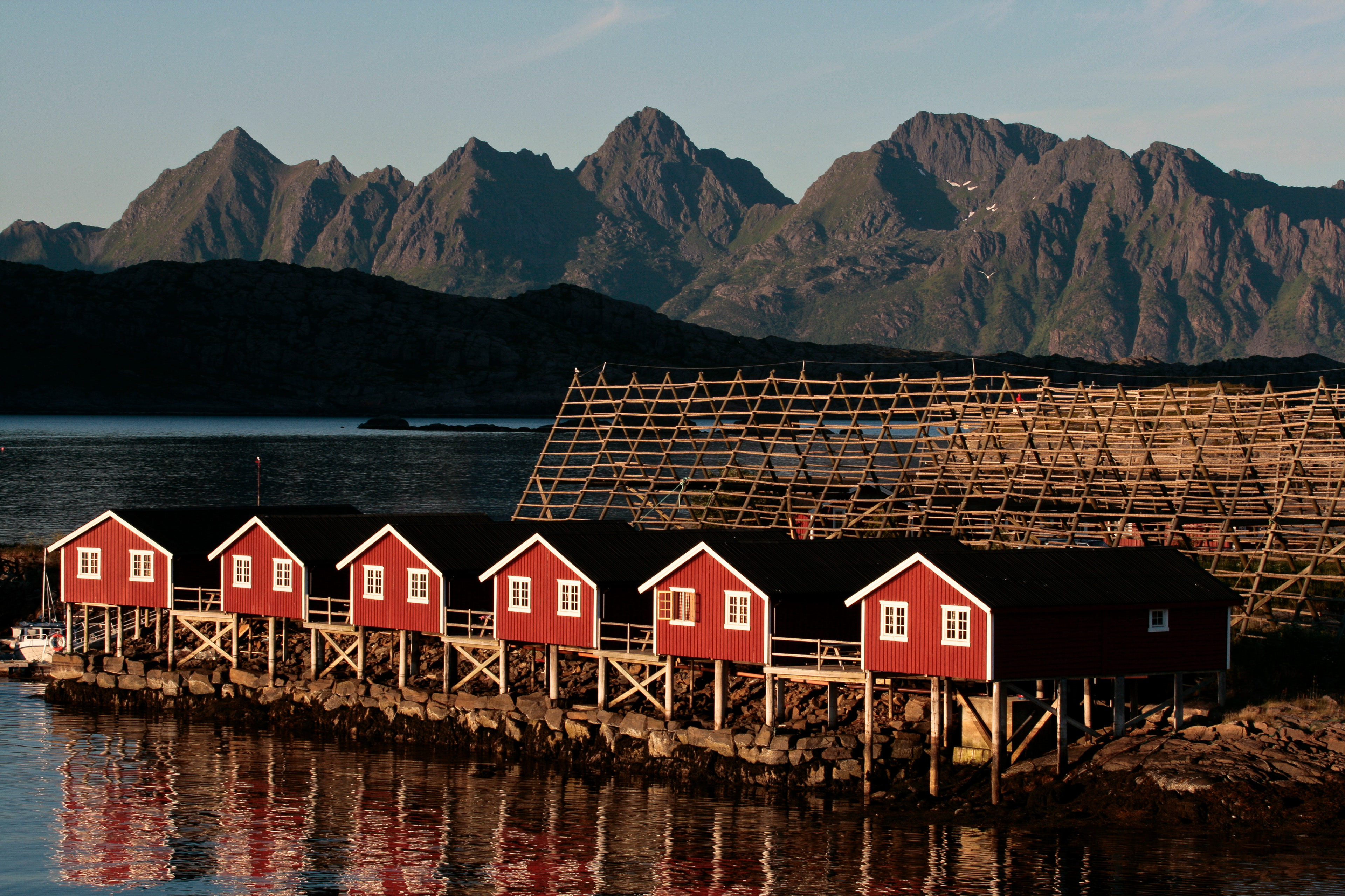 Revamped fishermen houses, drying racks and mountains in Svolvaer, Lofoten, Norway, July 2007