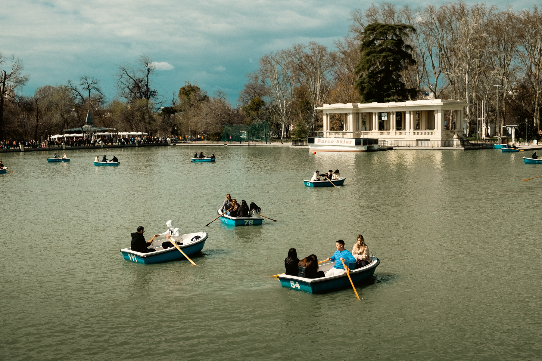 Paddling small boats on the Estanque Grande de El Retiro (The Great Pond)