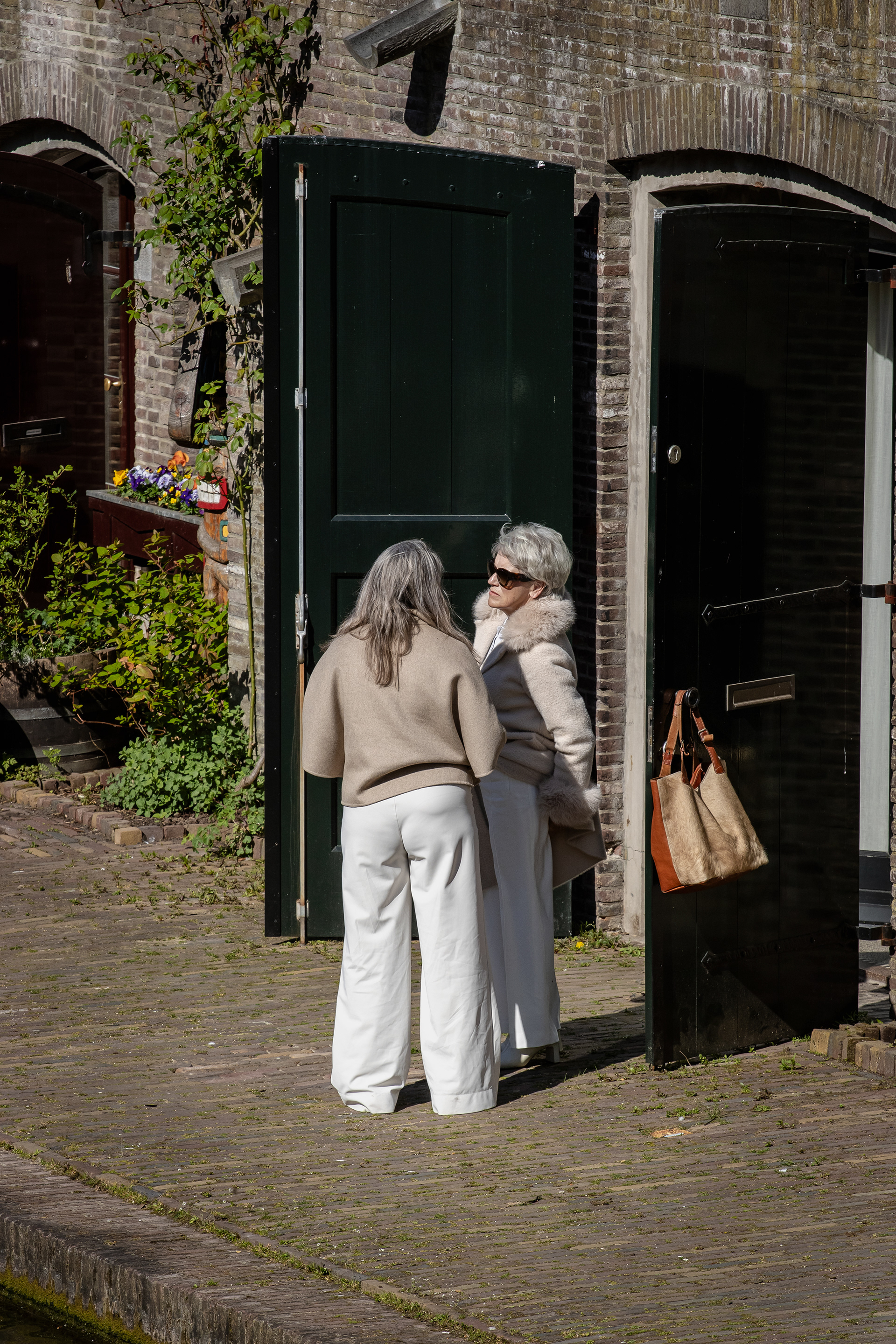 Two ladies talking.