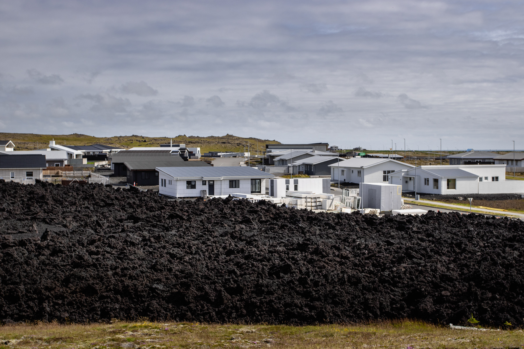 The cooled down lava stream hit this residential area of Grindavik in the 2023-2024 volcanic eruptions.