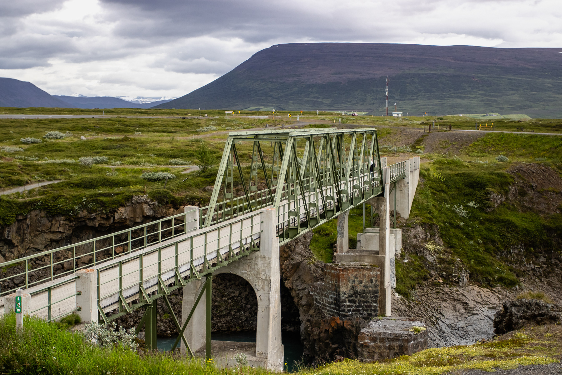 The pedestrian bridge at the Goðafoss waterfall