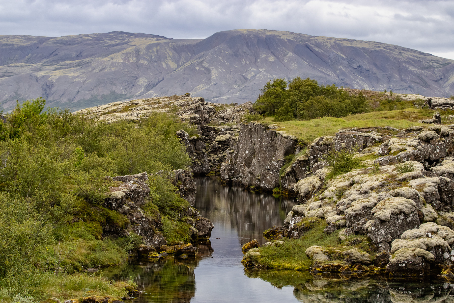 Despite its beauty, Thingvellir was also the site of punishments. At least 72 people were executed between 1602 and 1750. Males were beheaded or hanged, and about 18 women were drowned in possibly this little pond.