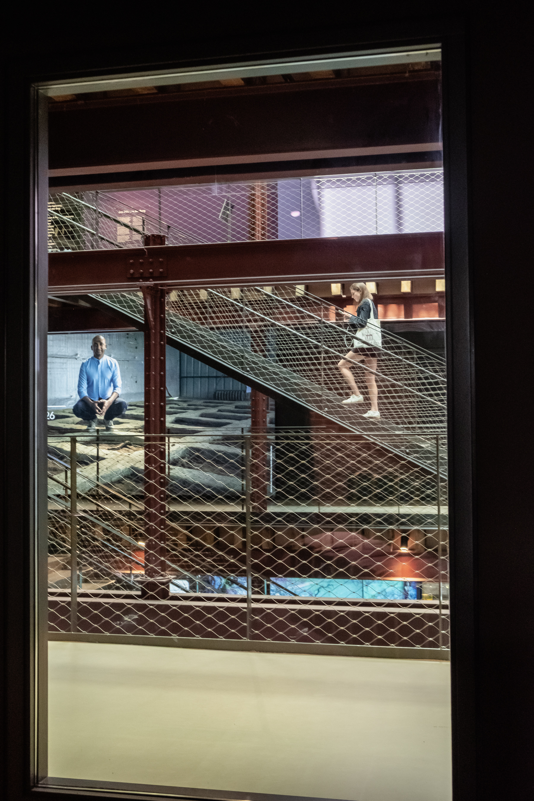 See through at the central staircase from one of the higher floors.