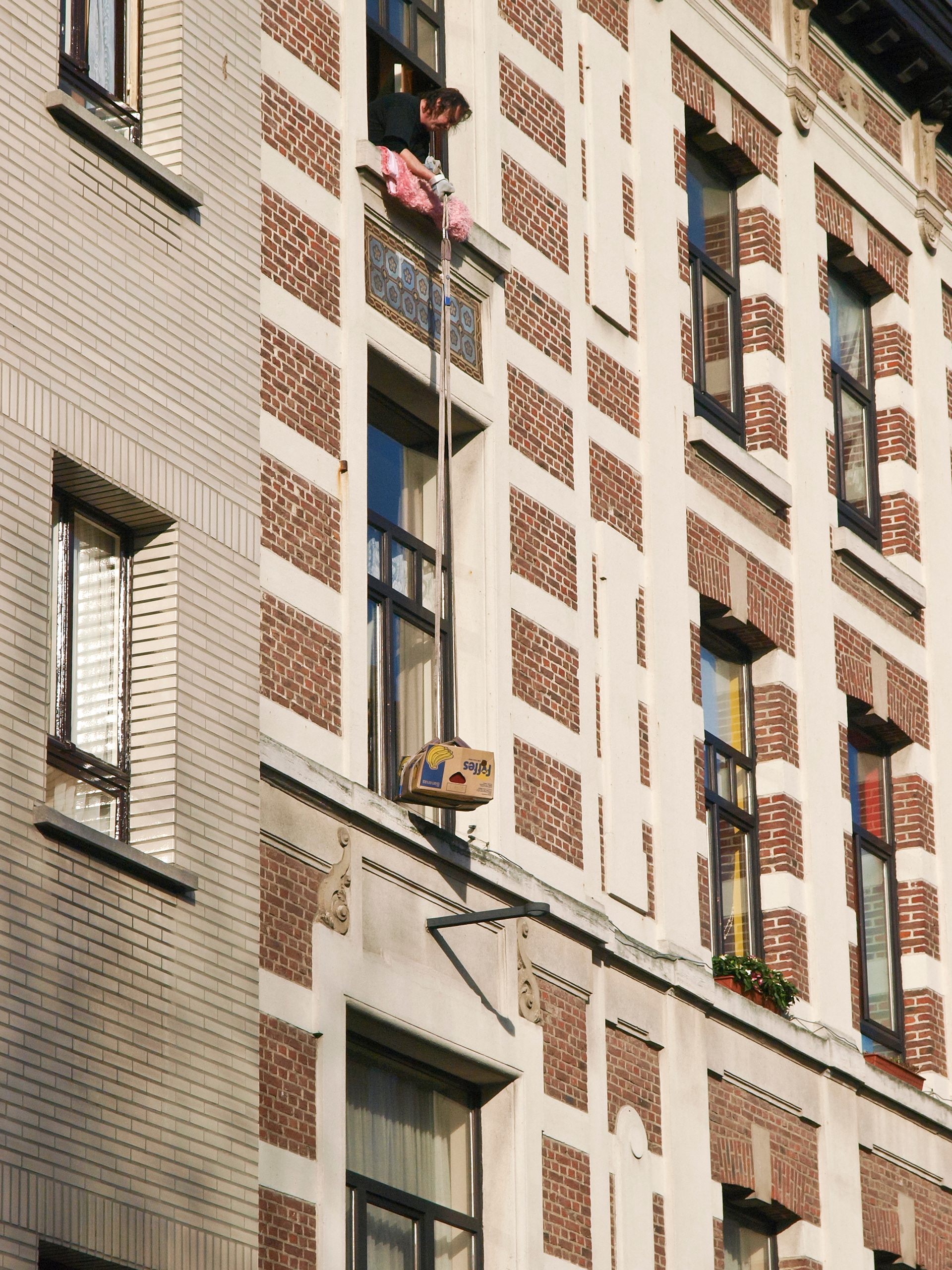 Moving goods at or near the Sint-Andriesplaats square, 2007.